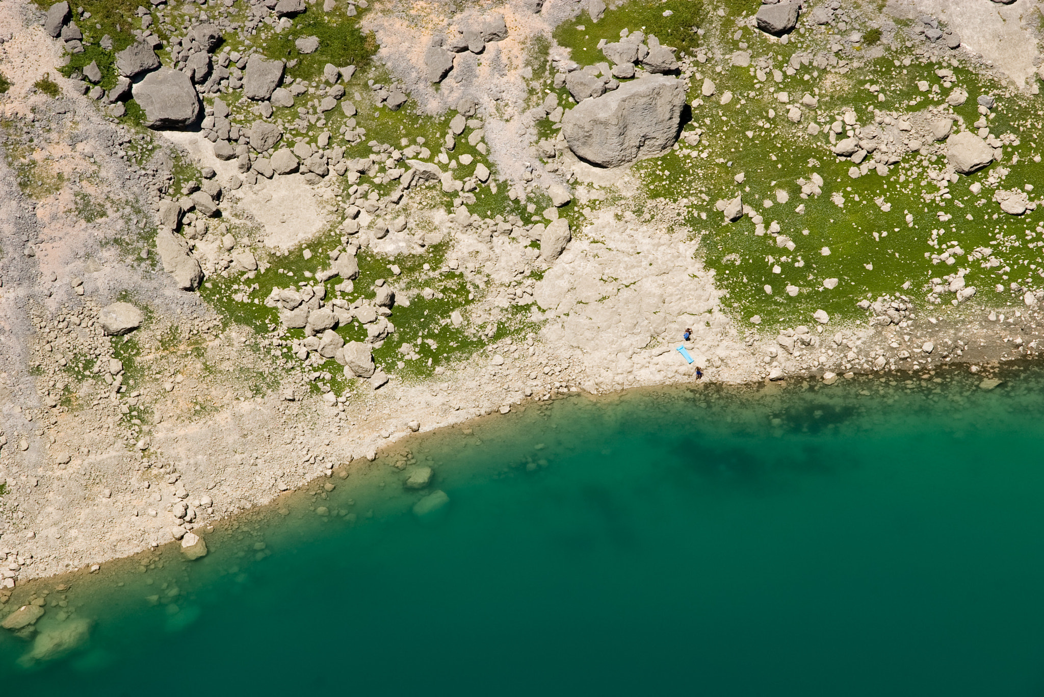 Pentax K100D sample photo. People swimming in blue lake photography