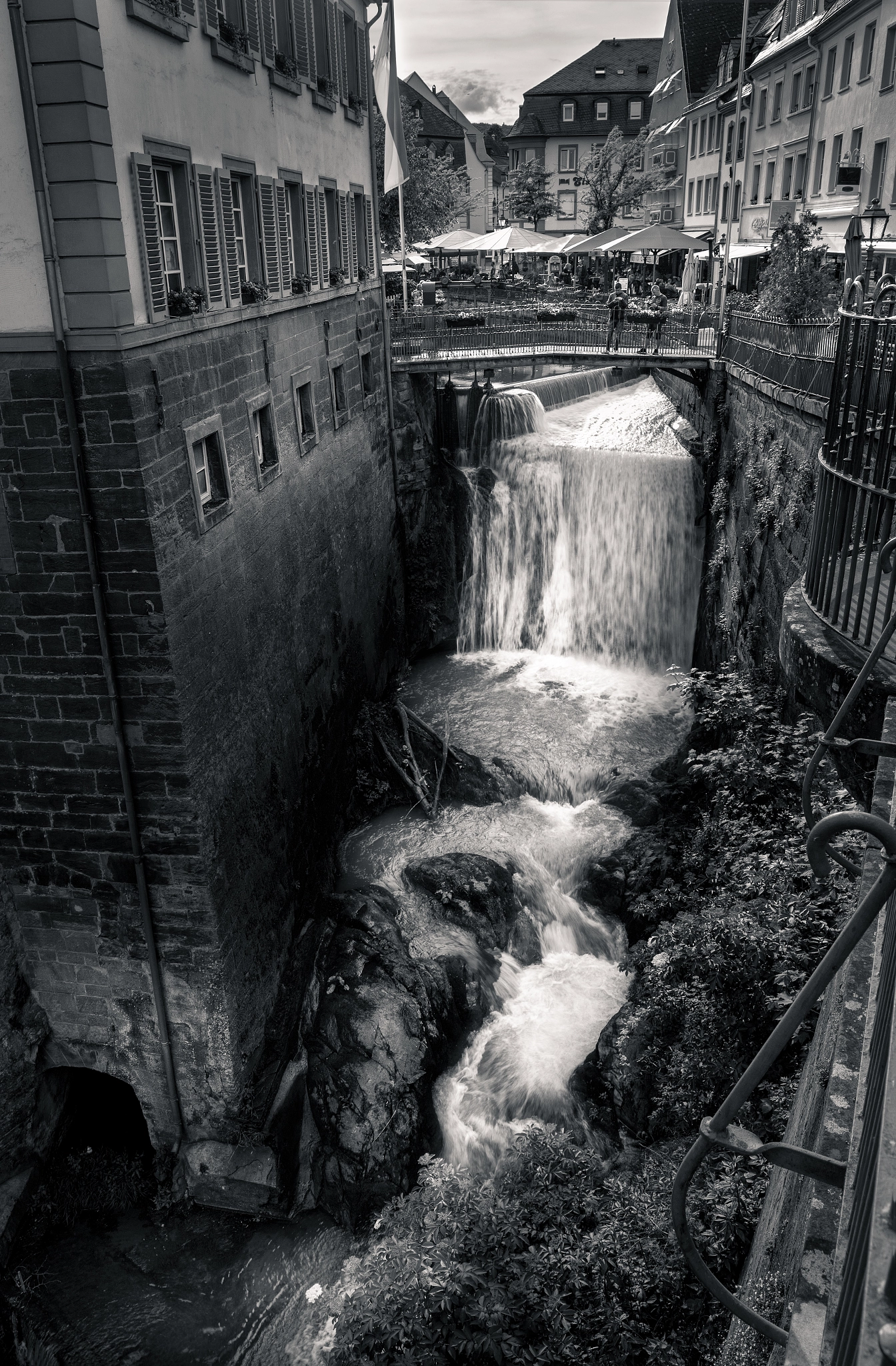 Canon EF 16-35mm F4L IS USM sample photo. Waterfall in the town of saarburg photography