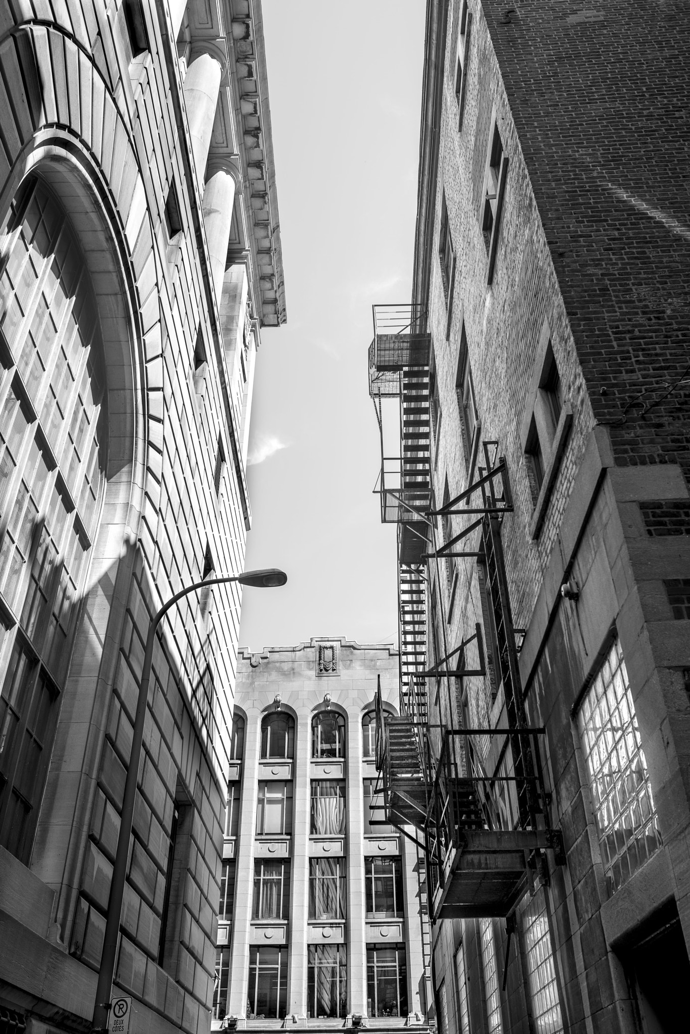 Nikon D800E + Nikon AF-S Nikkor 28mm F1.8G sample photo. Between the buildings photography