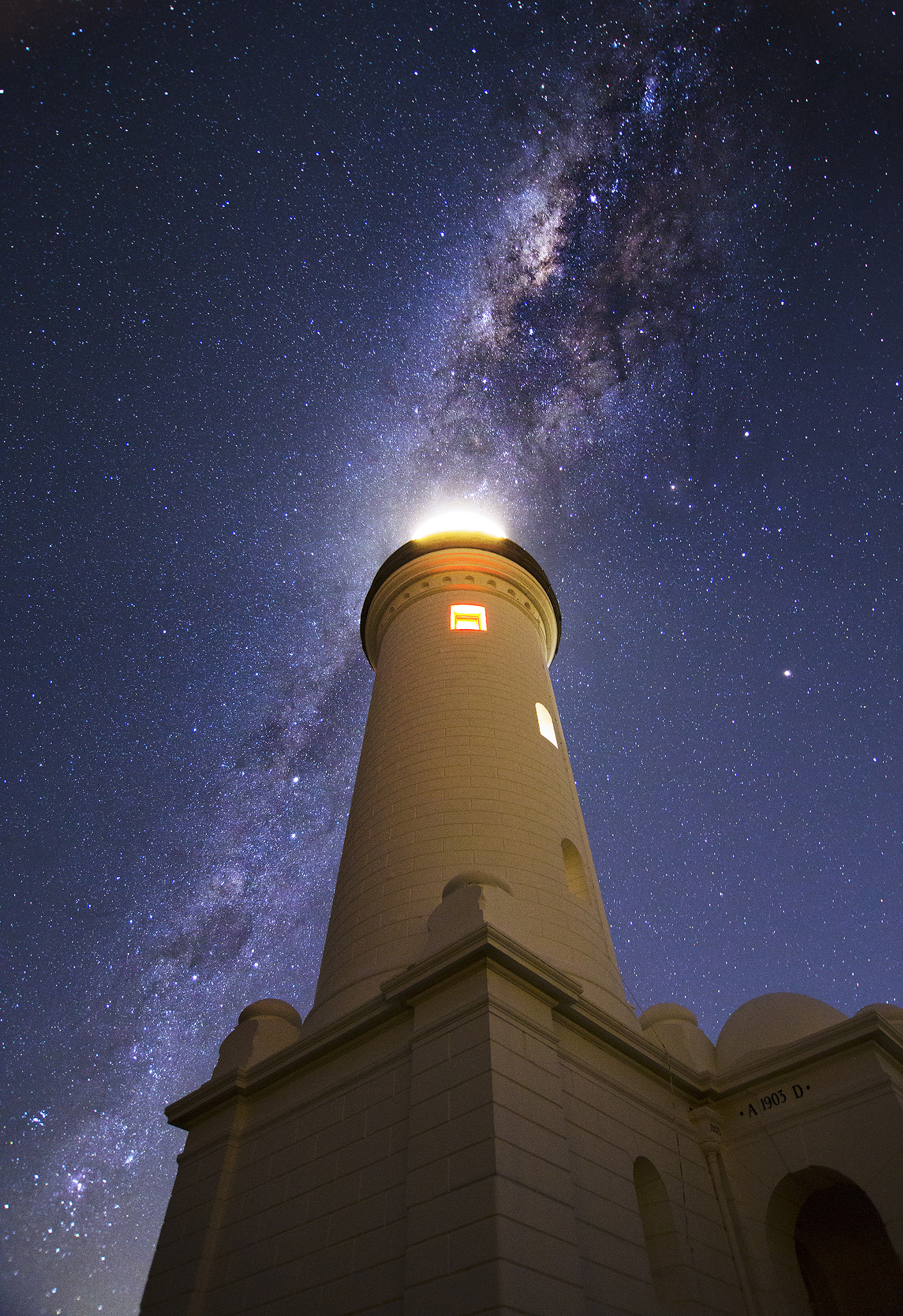 Tokina AT-X Pro 12-24mm F4 (IF) DX sample photo. Lighthouse in galaxy photography