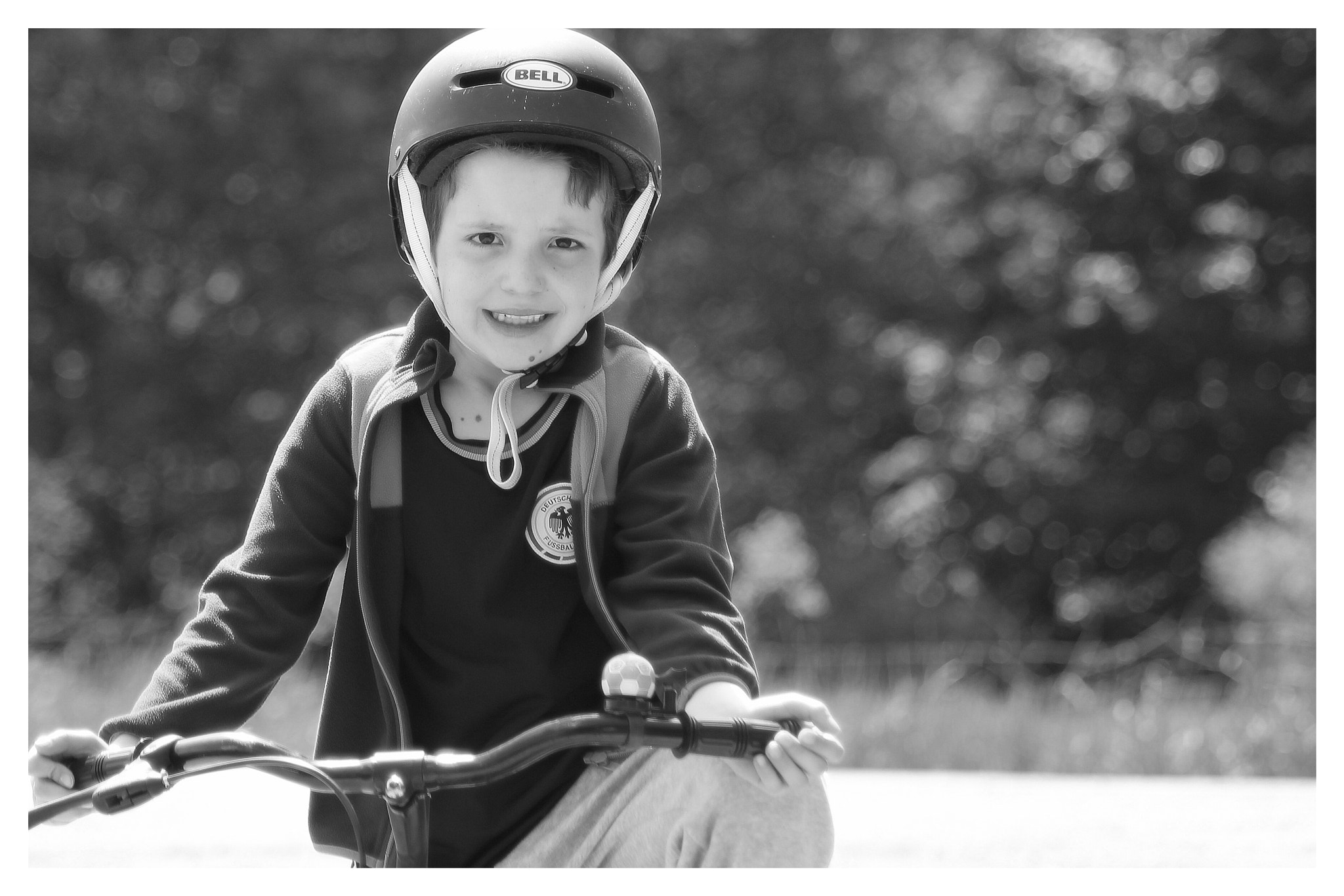Canon EOS 700D (EOS Rebel T5i / EOS Kiss X7i) + Canon 70-300mm sample photo. Biking child photography