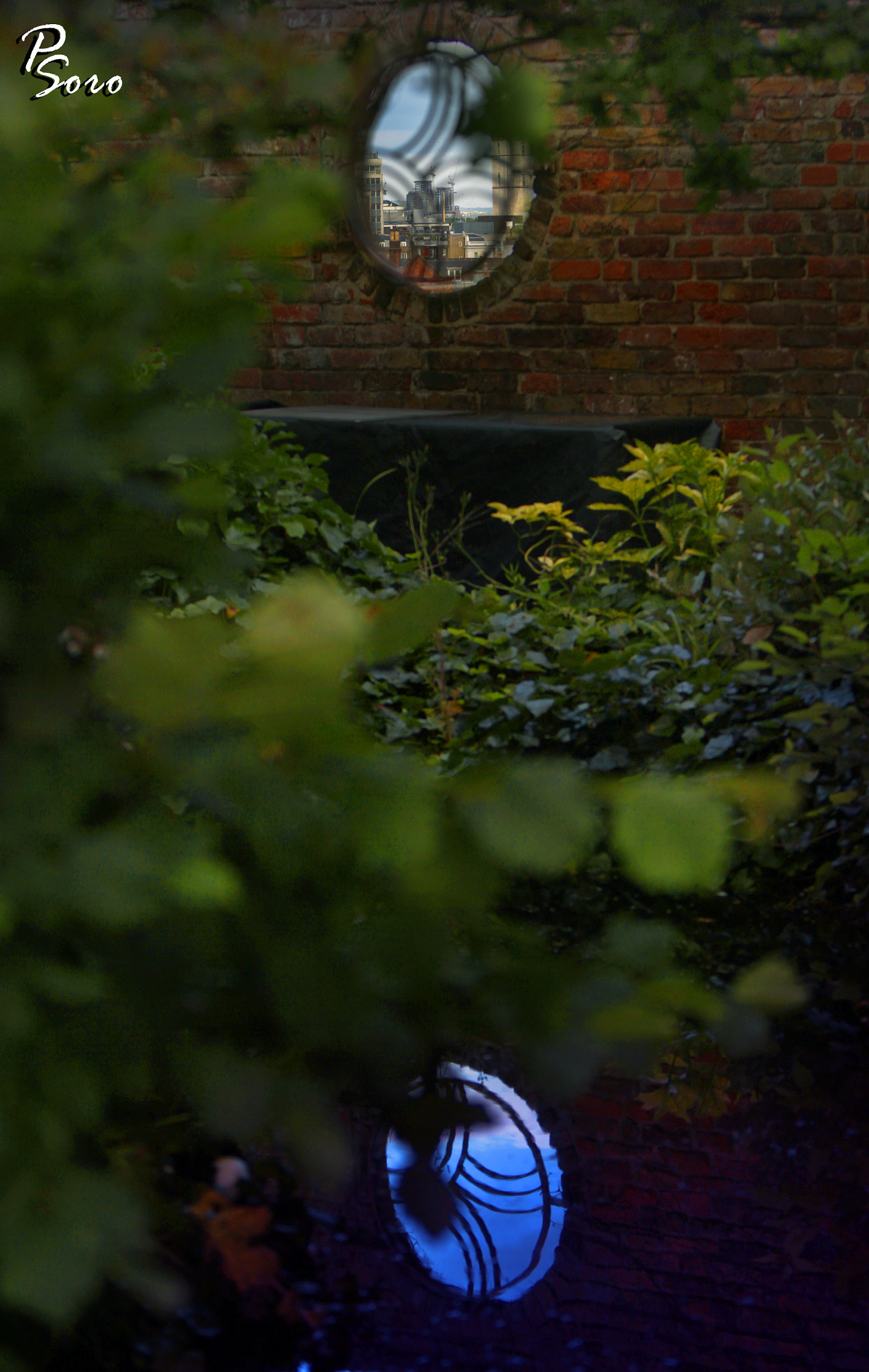 Canon EF 70-200mm F2.8L IS USM sample photo. View of the city through the wall ... photography