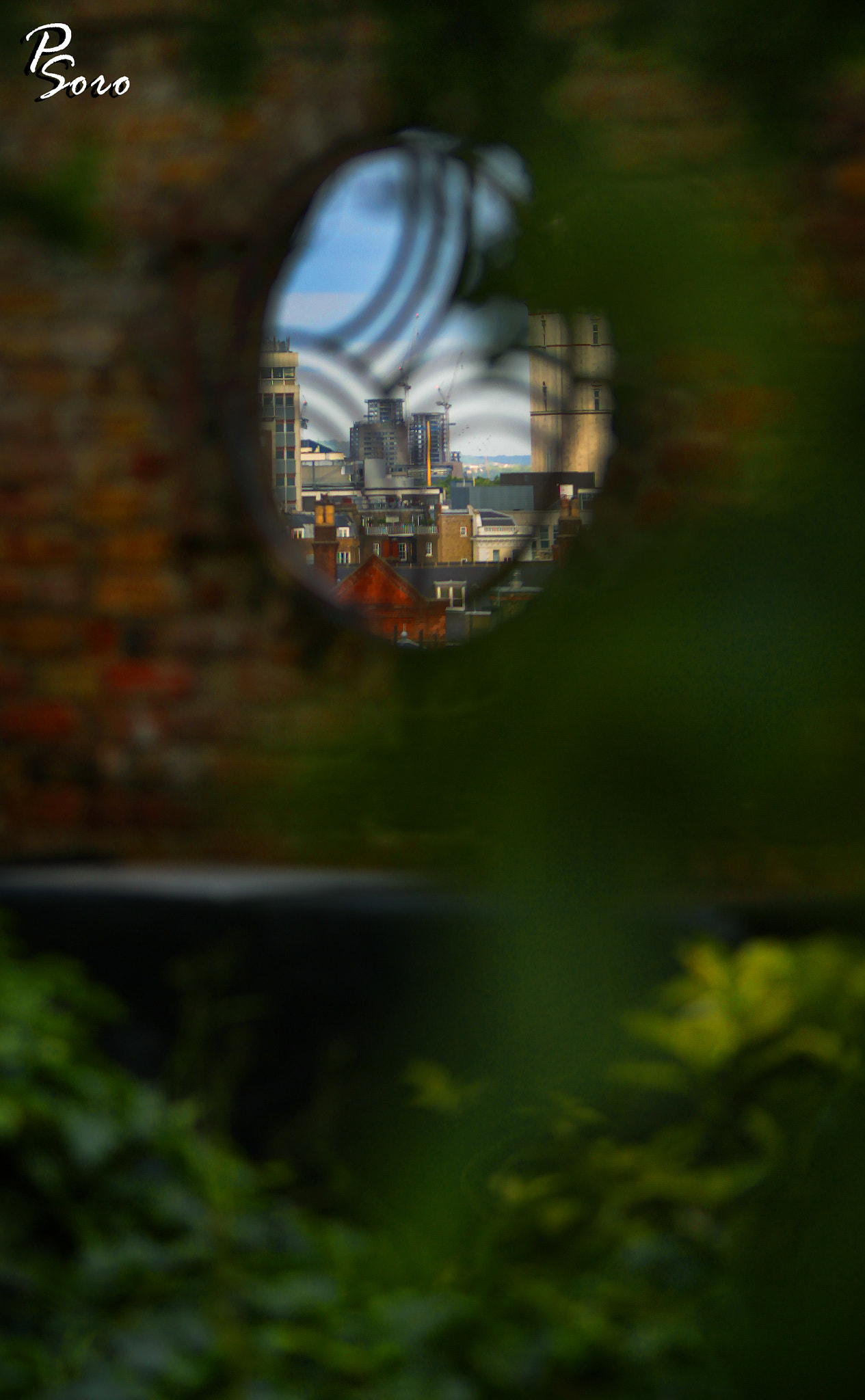 Canon EF 70-200mm F2.8L IS USM sample photo. View of the city through the wall ... photography
