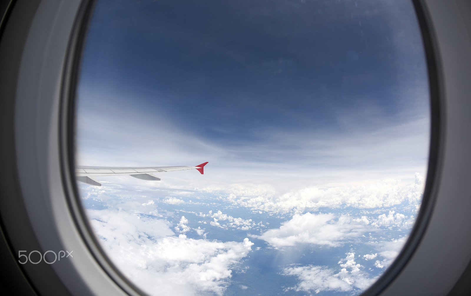 Nikon D810 + Nikon AF Fisheye-Nikkor 16mm F2.8D sample photo. Clouds, sky, wing plane as soon through window view of an airpla photography