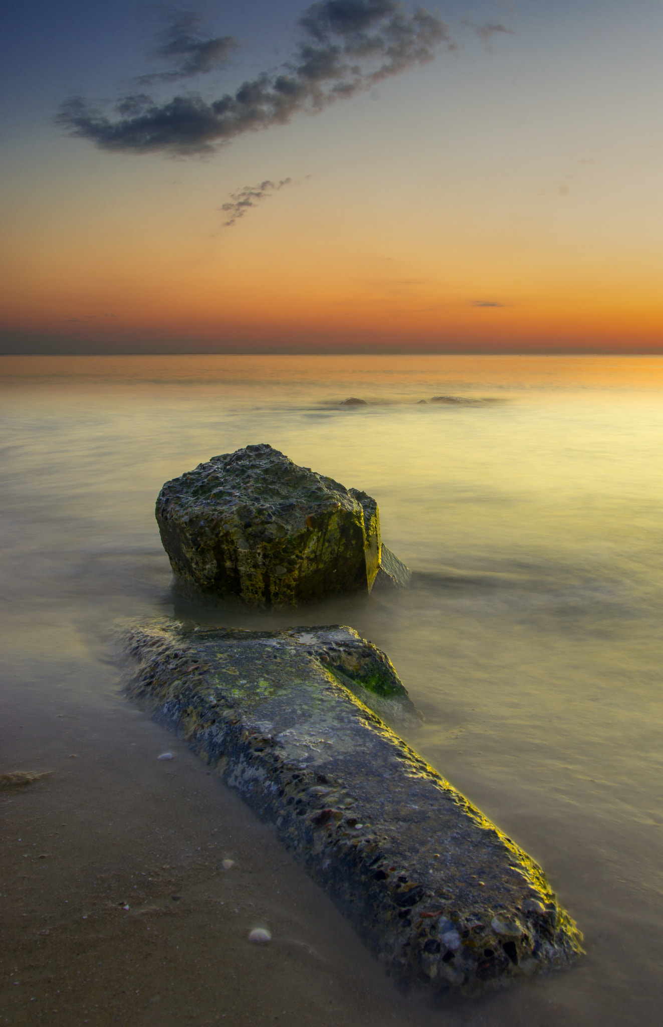 Nikon D7100 + Nikon AF-S Nikkor 20mm F1.8G ED sample photo. Rock in the sand photography