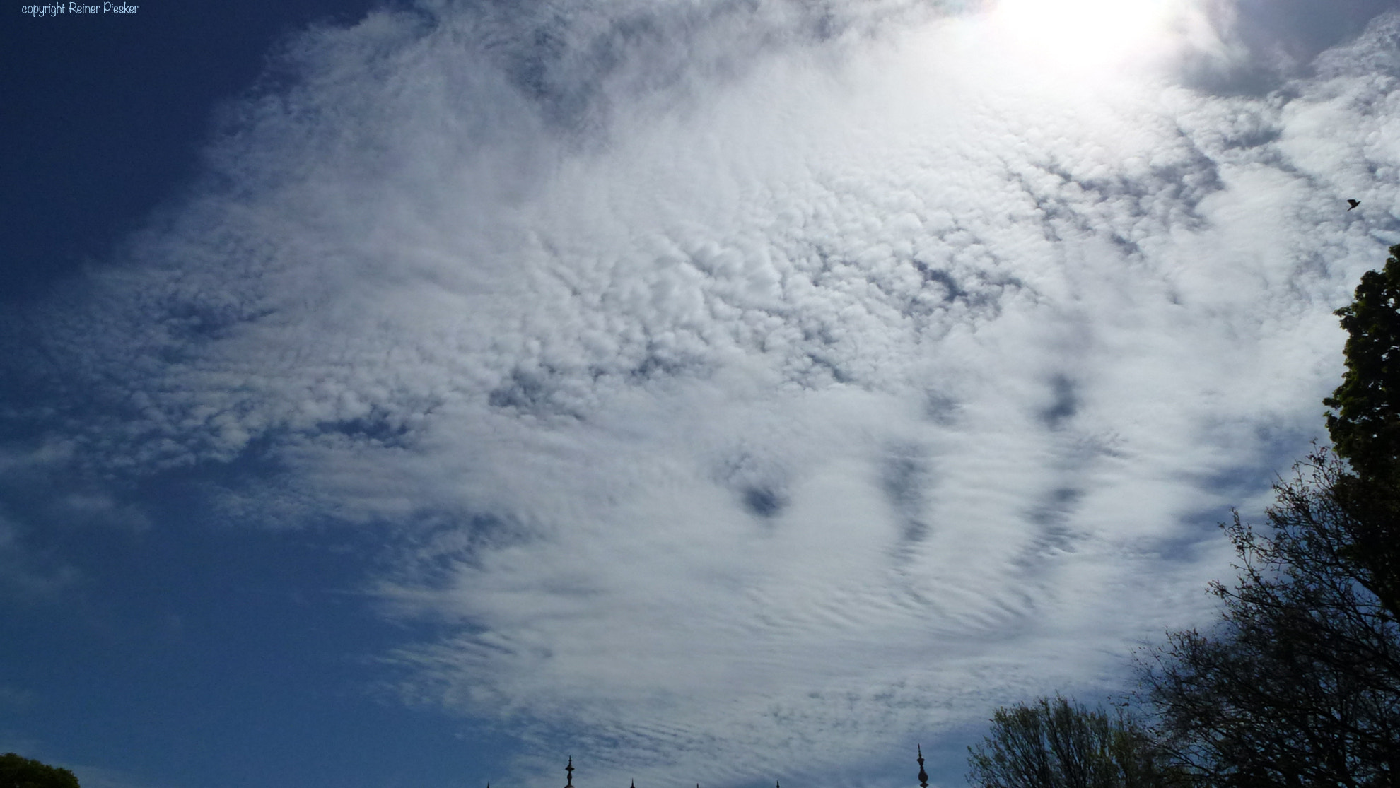 Leica V-Lux 30 / Panasonic Lumix DMC-TZ22 sample photo. Cloud above royal pavillion photography