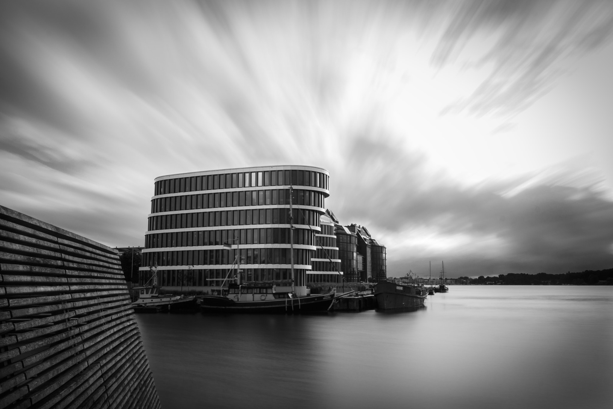 Canon EOS 700D (EOS Rebel T5i / EOS Kiss X7i) + Canon EF 16-35mm F4L IS USM sample photo. Aida cruises building in rostock in b/w photography