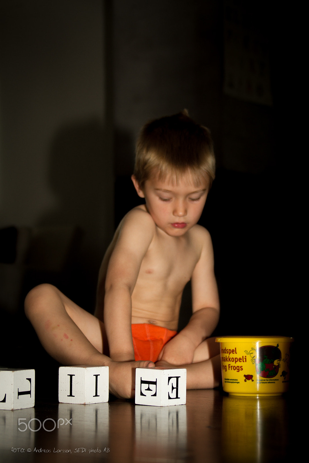 Canon EF 28-300mm F3.5-5.6L IS USM sample photo. Boy with toys photography