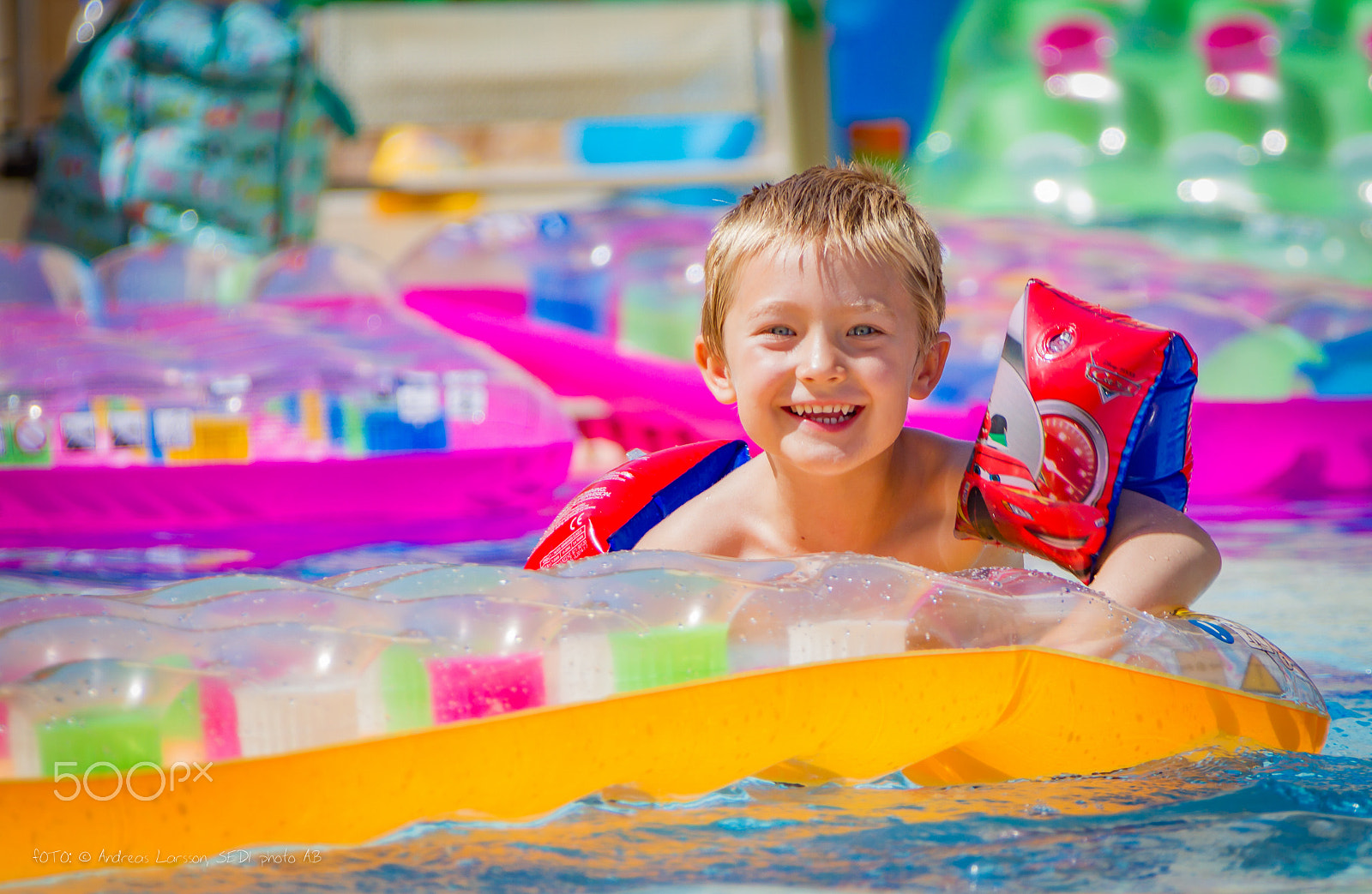 Canon EF 28-300mm F3.5-5.6L IS USM sample photo. Boy in pool photography