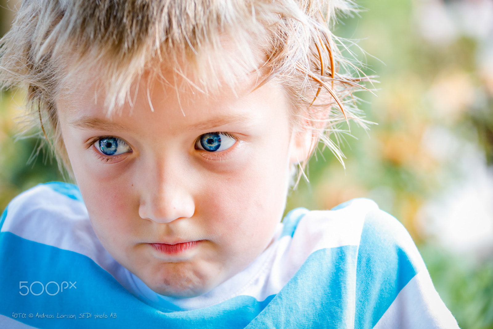 Canon EF 28-300mm F3.5-5.6L IS USM sample photo. Pensive boy photography