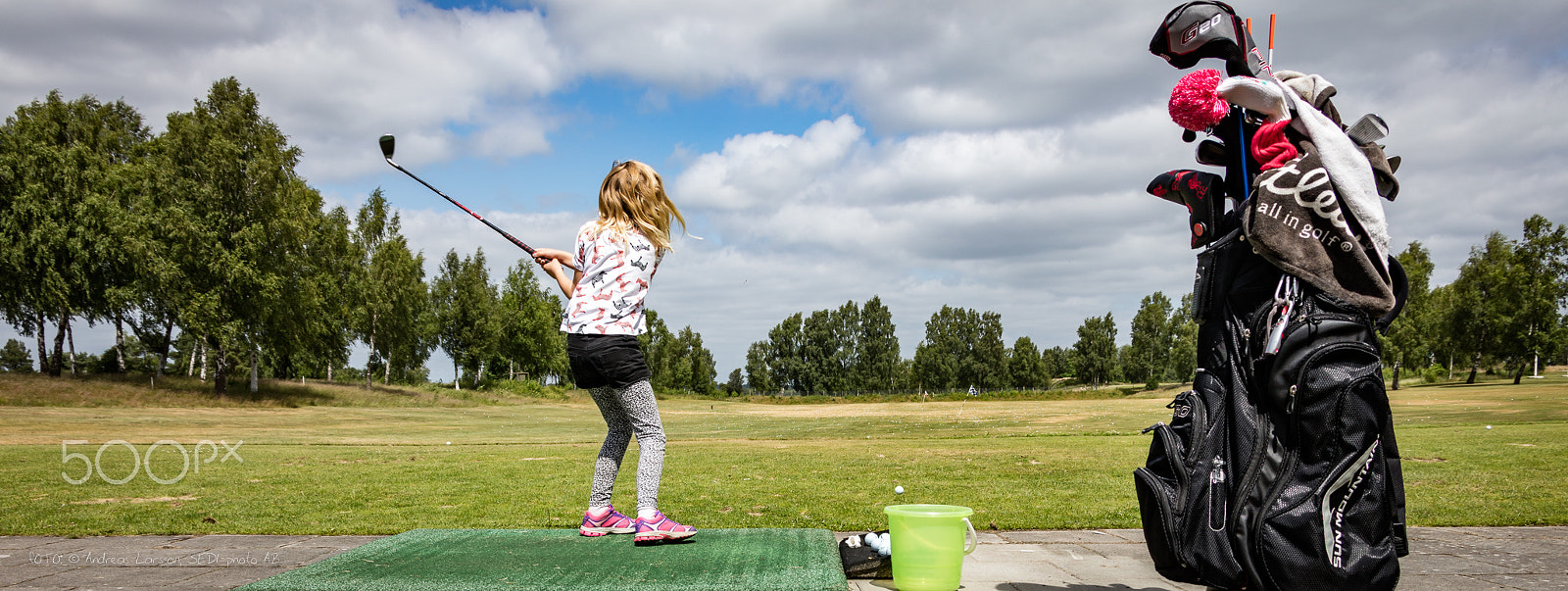 Canon EF 28-300mm F3.5-5.6L IS USM sample photo. Girl playing golf photography