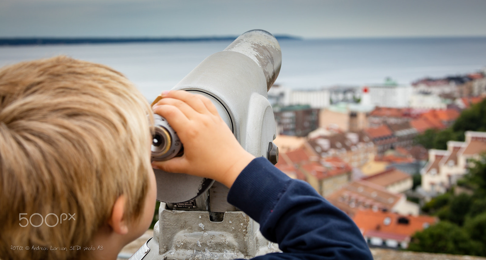 Canon EF 28-300mm F3.5-5.6L IS USM sample photo. Boy looking in telescope photography