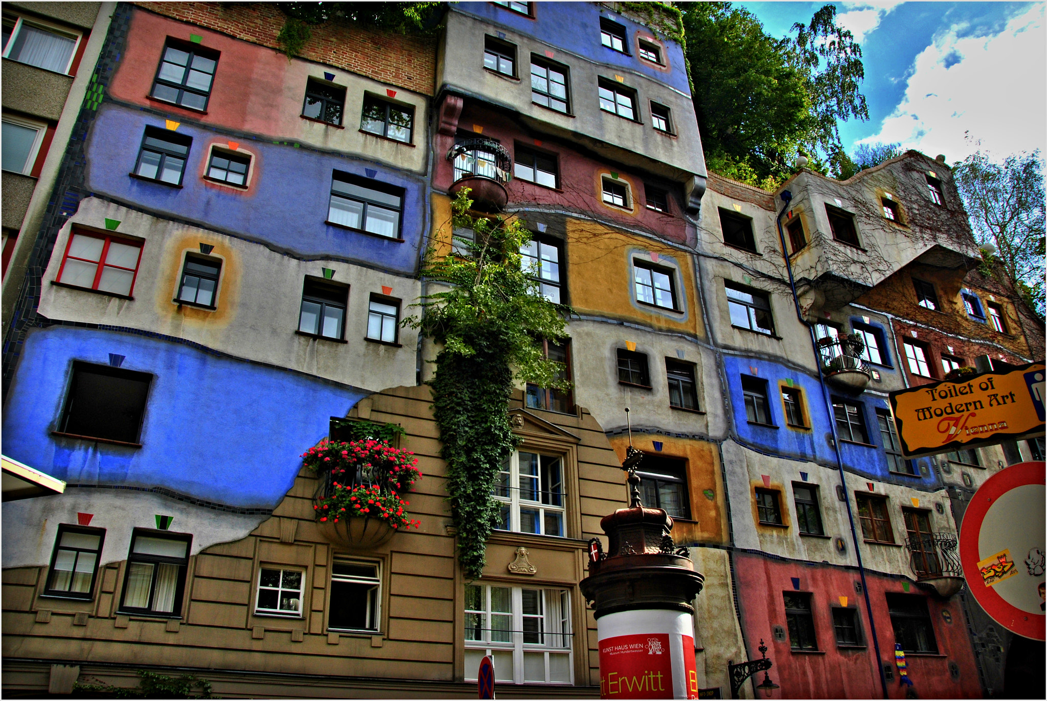 Nikon D3000 + Nikon AF-S DX Nikkor 18-200mm F3.5-5.6G ED VR II sample photo. Colorful apartments of the hundertwasser house photography