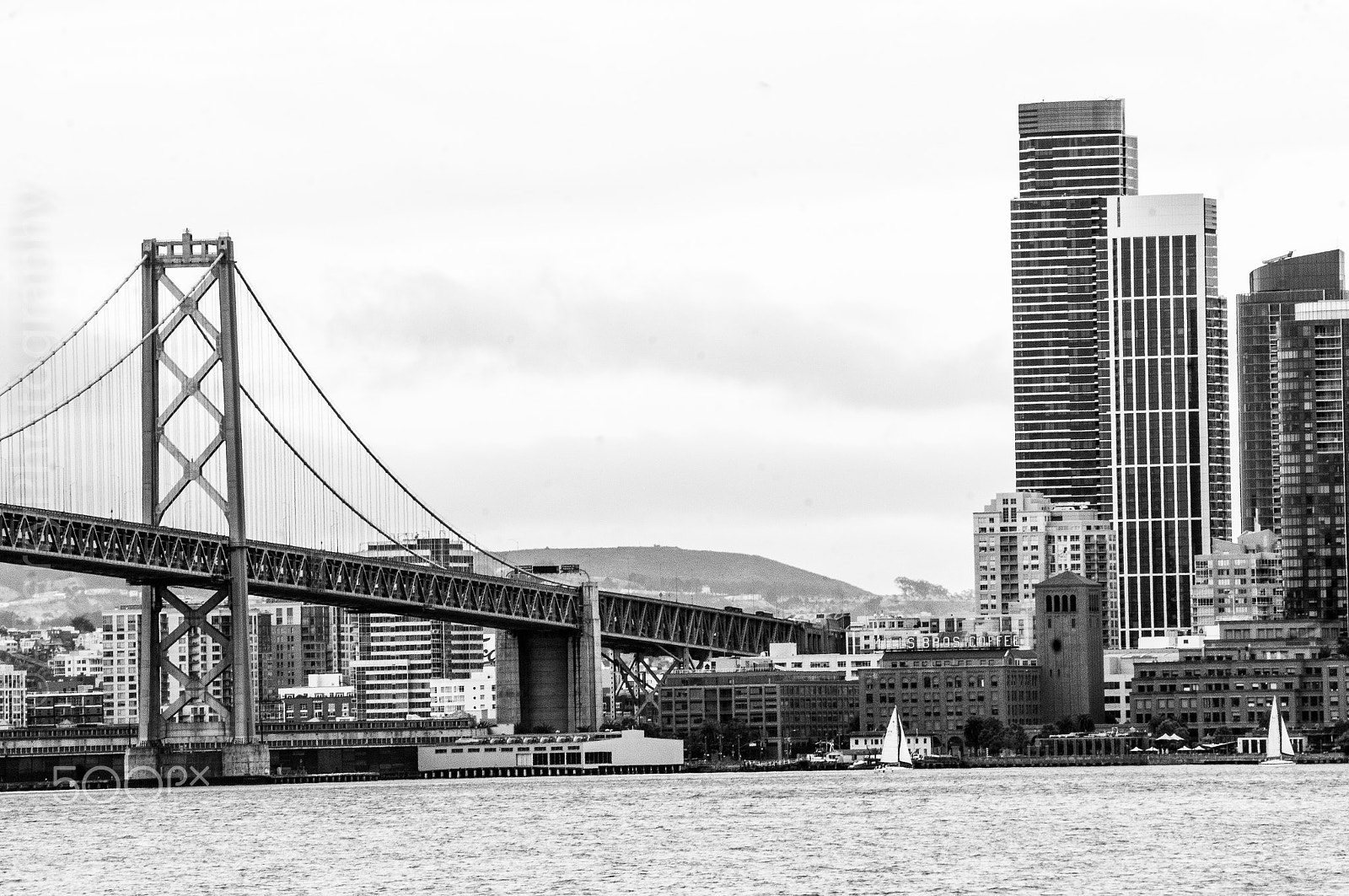 Sony Alpha NEX-5N + Sony E 55-210mm F4.5-6.3 OSS sample photo. Bay bridge into the city photography