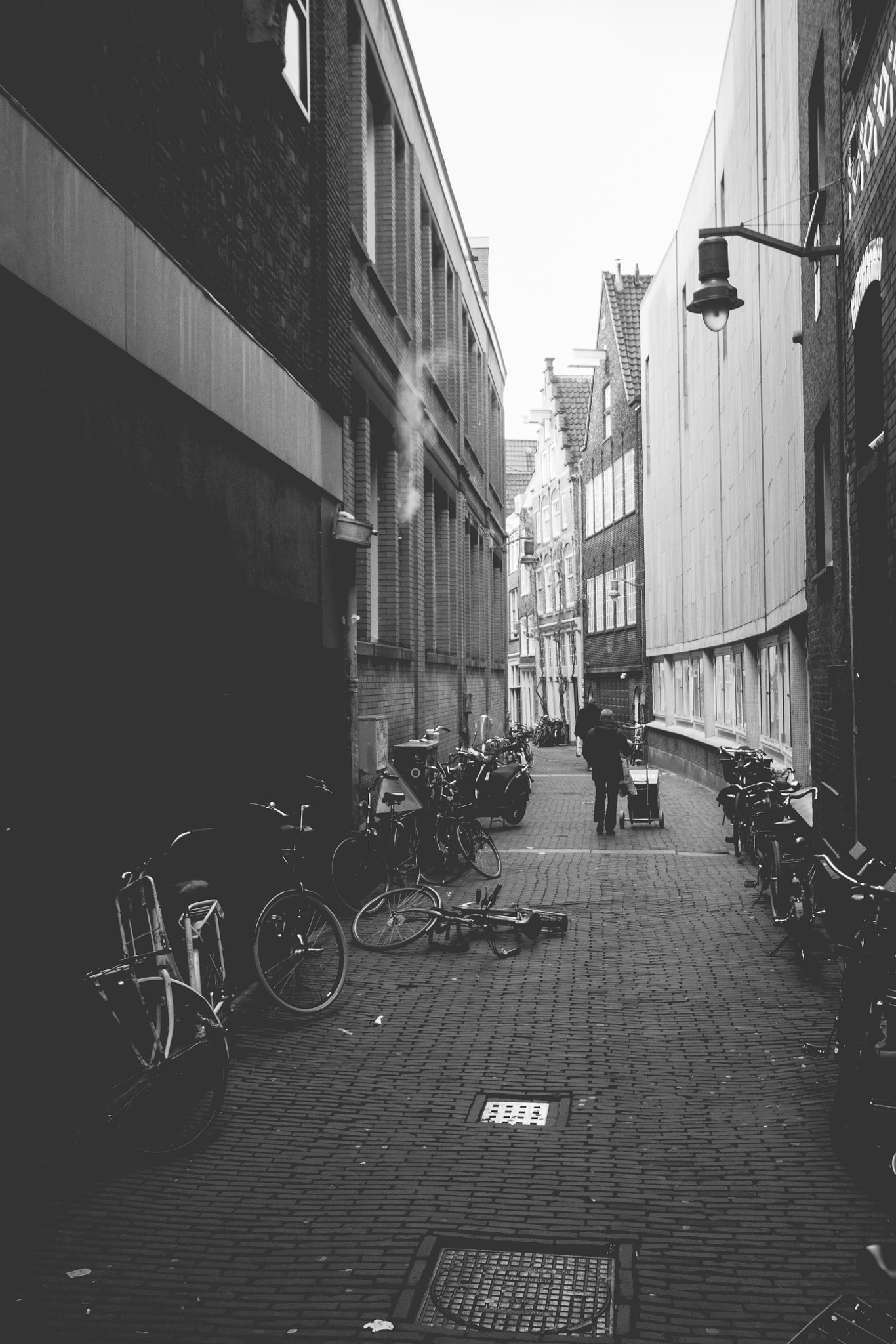 Canon EOS 1100D (EOS Rebel T3 / EOS Kiss X50) + Sigma 10-20mm F4-5.6 EX DC HSM sample photo. Scattered bikes. photography