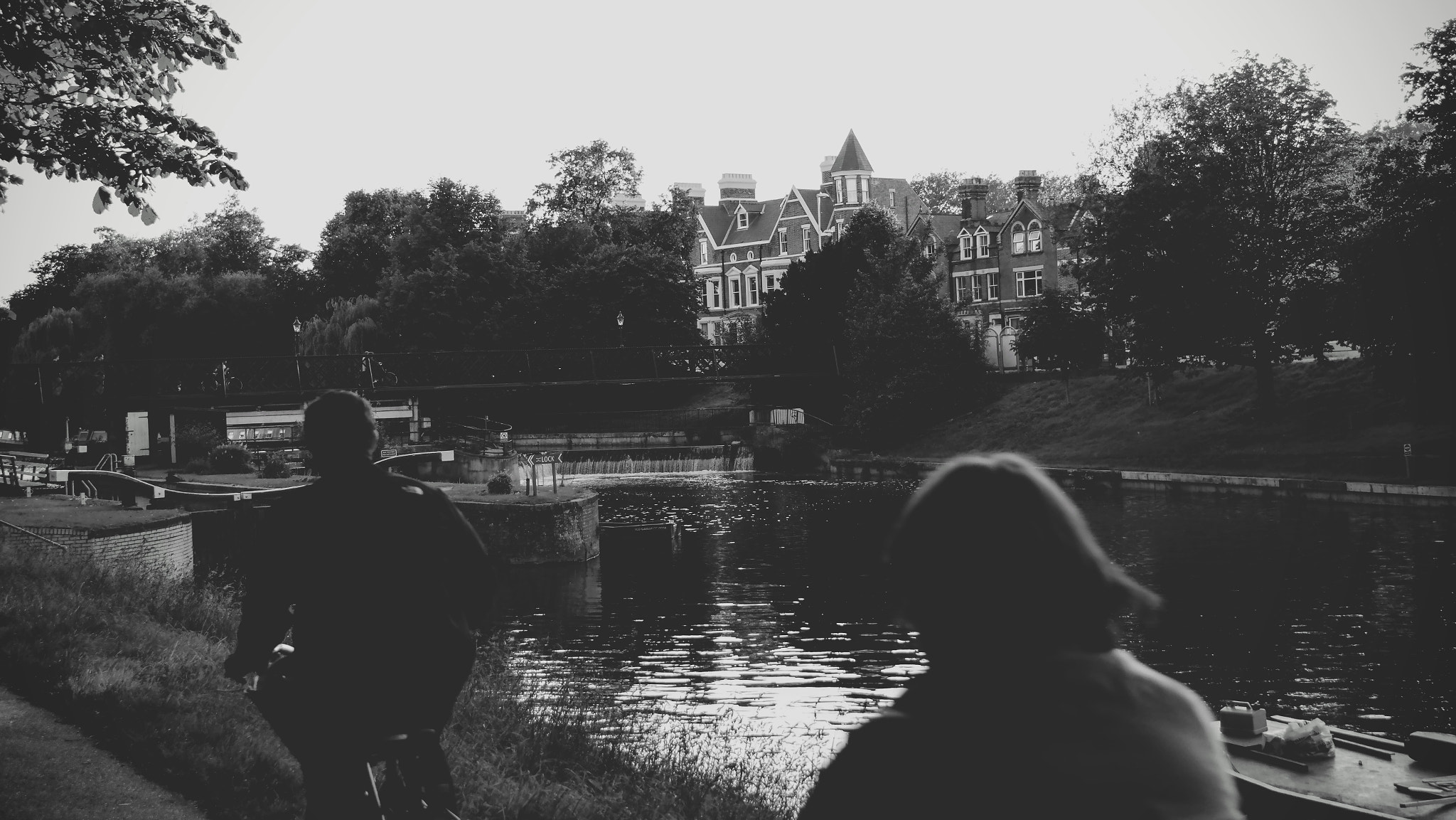 Samsung EK-GN120 sample photo. Evening cyclists along the cam photography