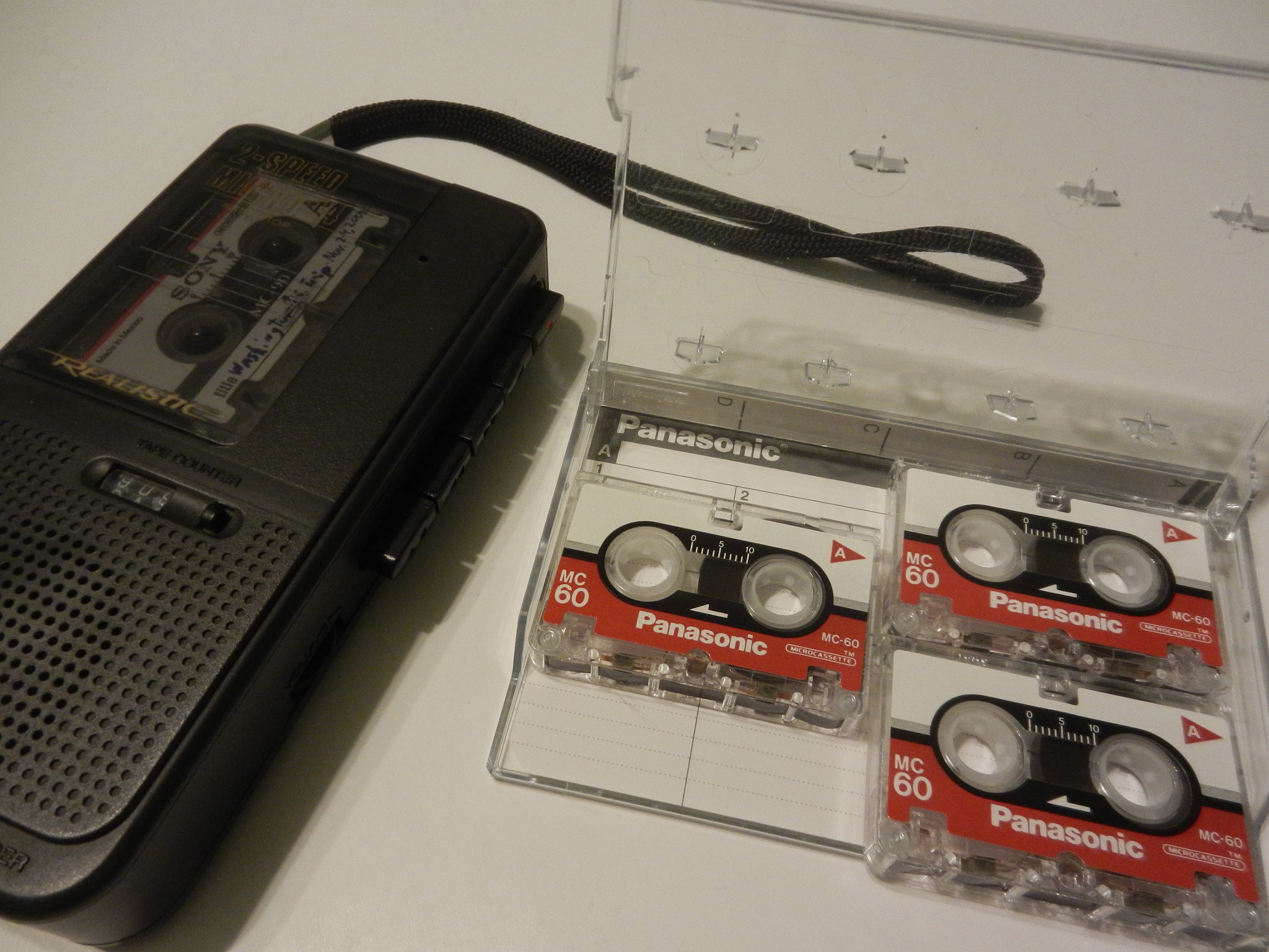 Nikon Coolpix S800c sample photo. Microcassette recorder and tape photography