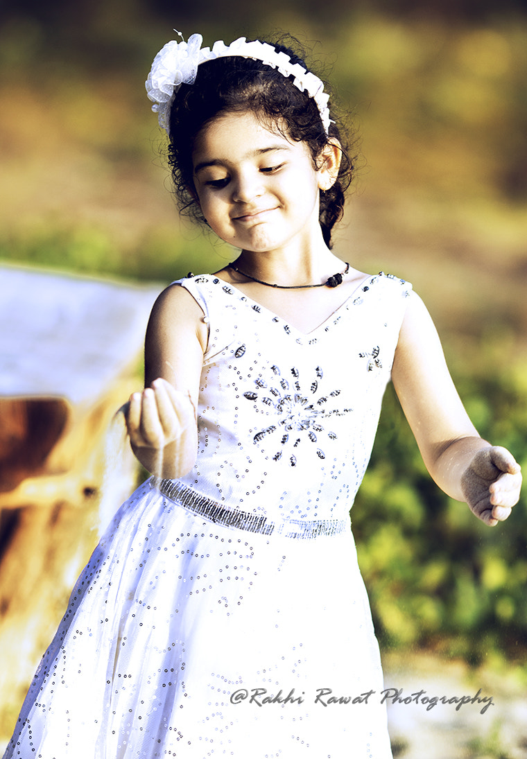 Canon EOS 70D + Canon EF 135mm F2L USM sample photo. Playful mood photography