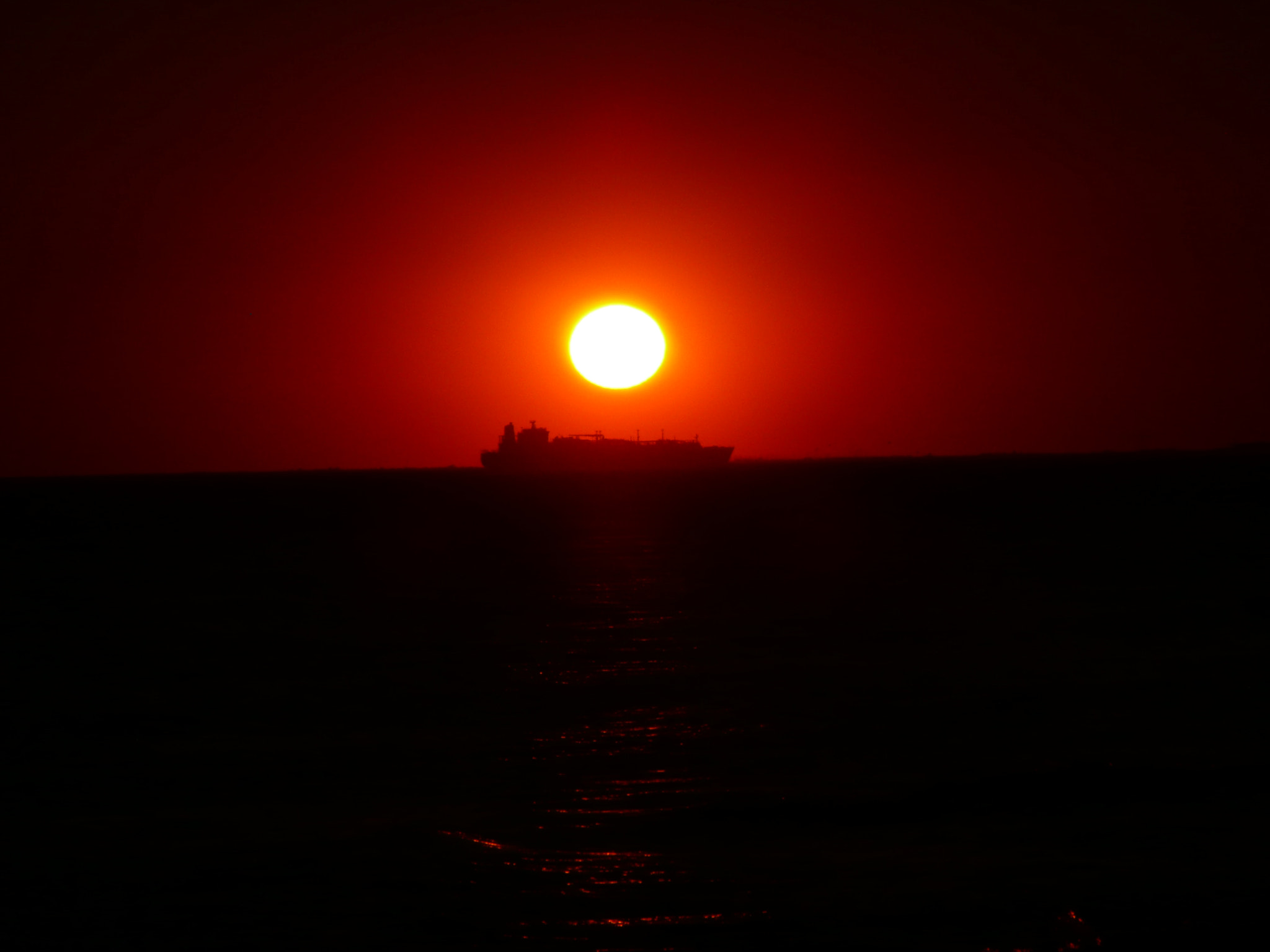 Panasonic DMC-TZ2 sample photo. Sunset on ship martigue france photography