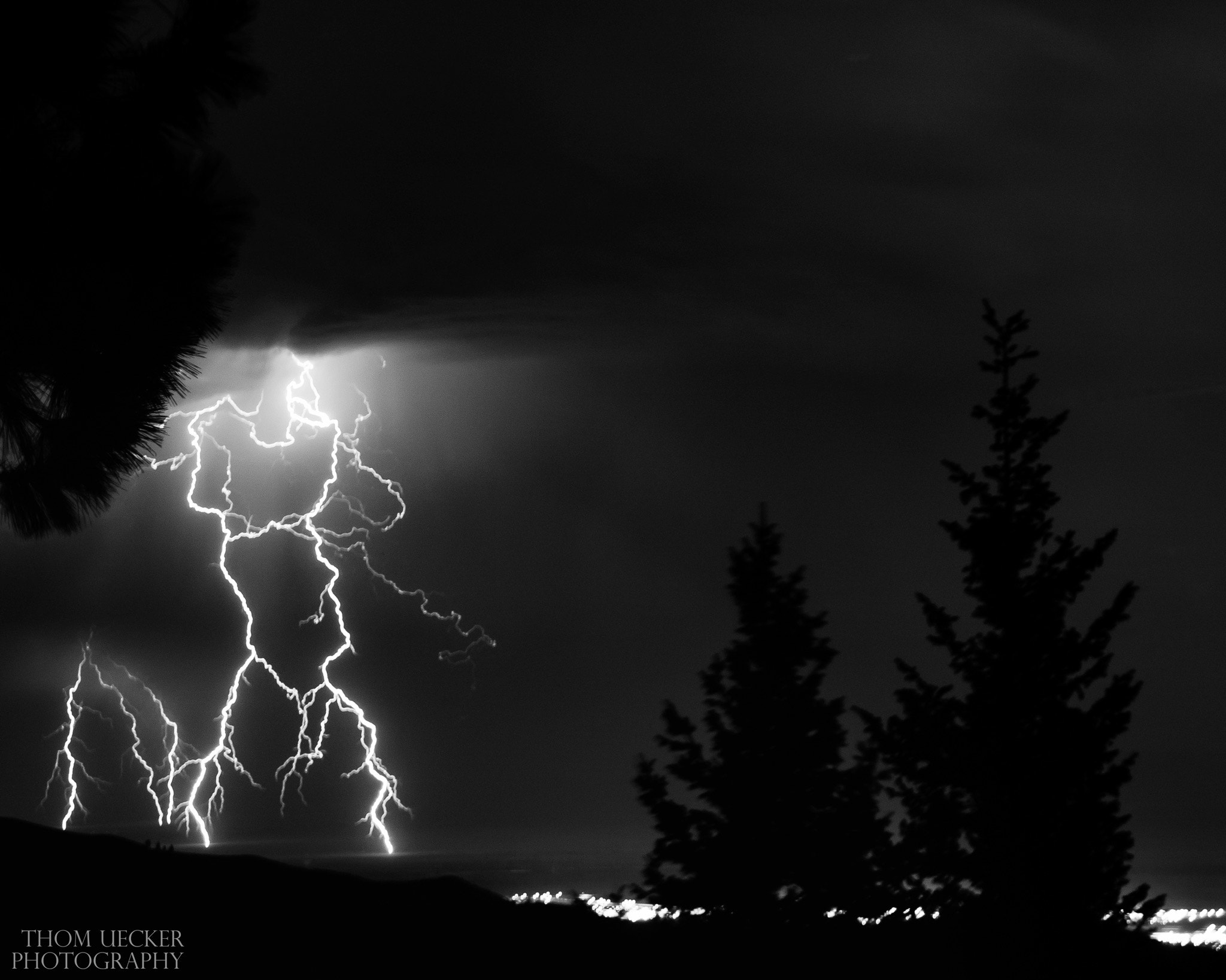 Canon EOS 500D (EOS Rebel T1i / EOS Kiss X3) + Canon EF 28-90mm f/4-5.6 sample photo. Lightning hitting the ground in boise, idaho. shot from bogus basin photography
