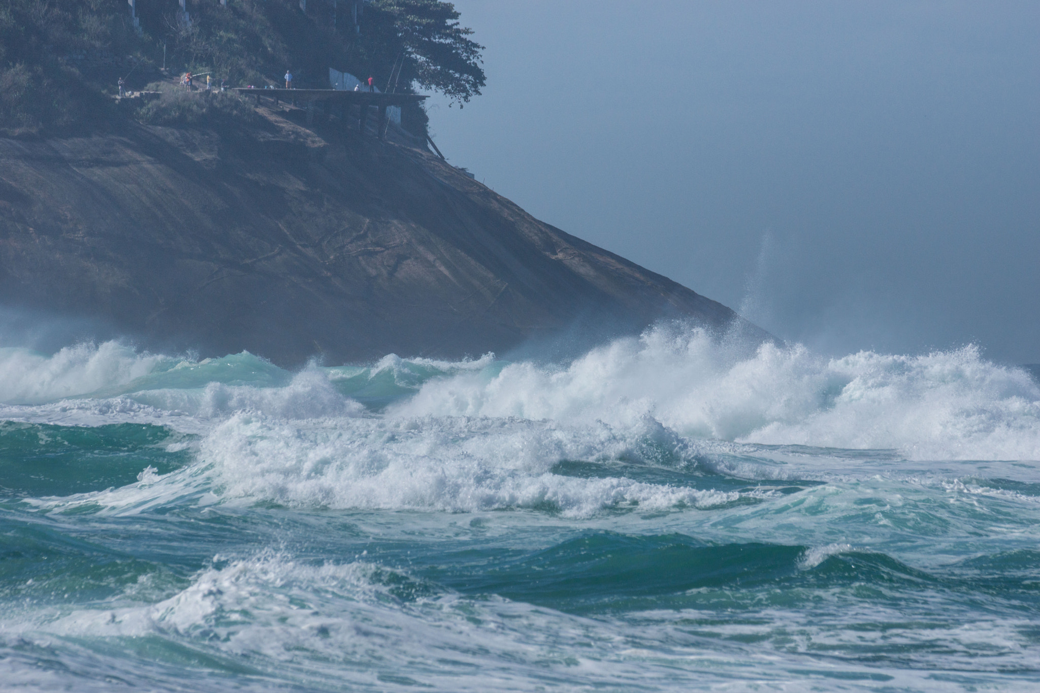 Sony 70-300mm F4.5-5.6 G SSM sample photo. Fishing in storm waves photography