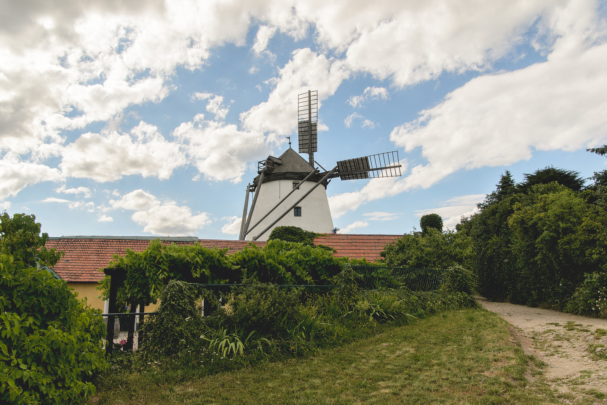 Nikon D7000 + Sigma 18-50mm F2.8 EX DC Macro sample photo. Only windmill in austria photography