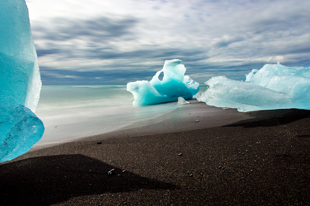 Ice blocks on black beach by Marc Salm on 500px.com