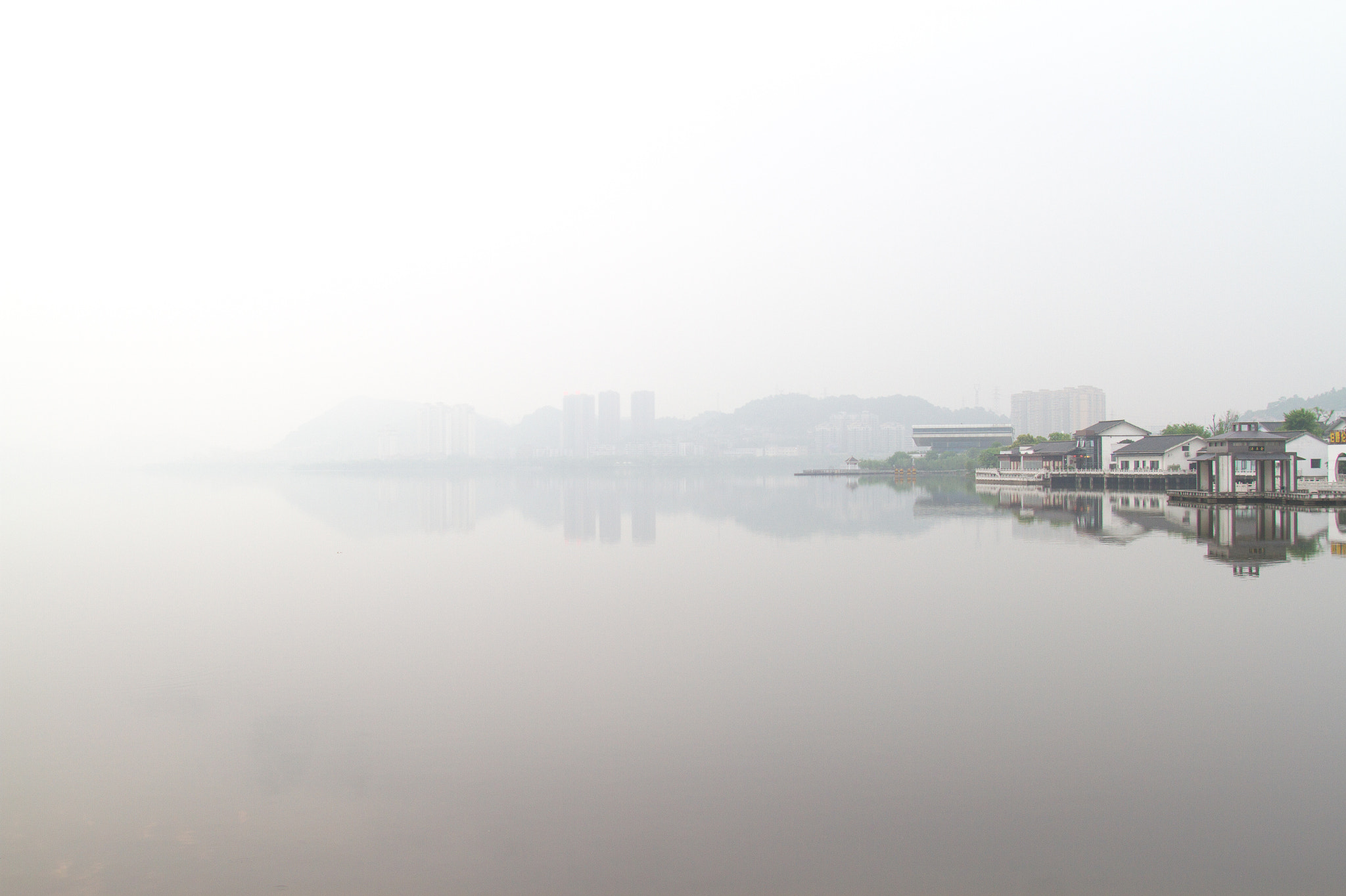 Canon EOS 7D + Canon EF 20-35mm f/2.8L sample photo. Huangshi lake reflection with smog photography