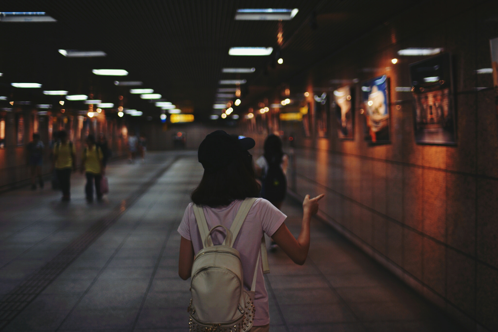 Nikon D5200 + Sigma 30mm F1.4 EX DC HSM sample photo. Girl in taipei subway photography