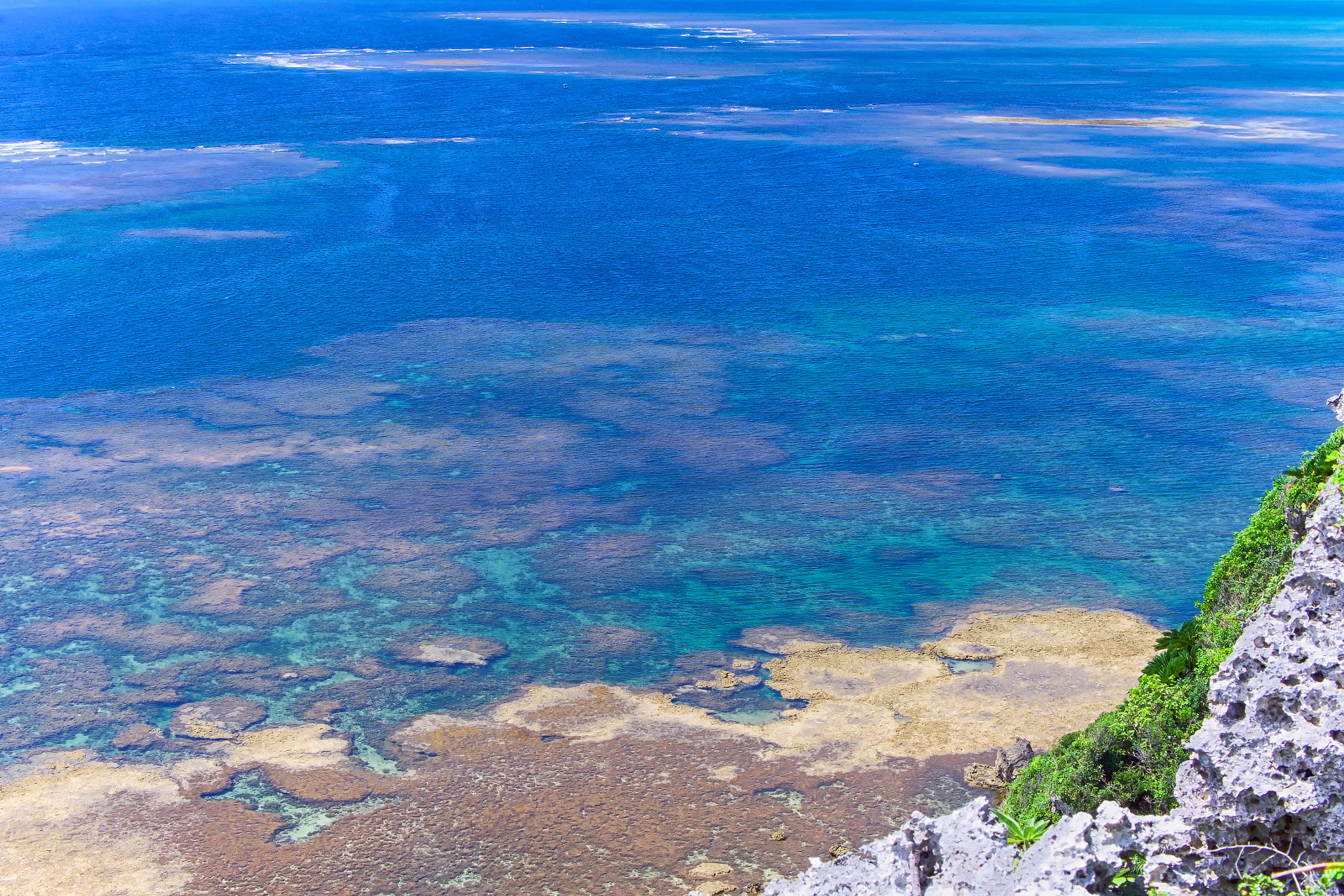 Panasonic Lumix DMC-GH3 + LUMIX G 25/F1.7 sample photo. Sea of coral reef seen from okinawa miyagi island. photography
