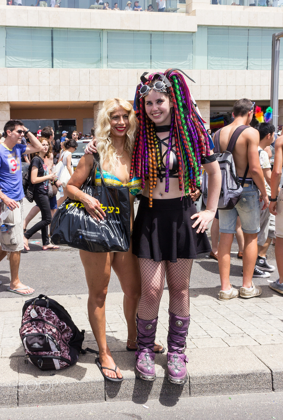 Canon EF 75-300mm F4.0-5.6 IS USM sample photo. Members of pride parade poses for the photographer photography