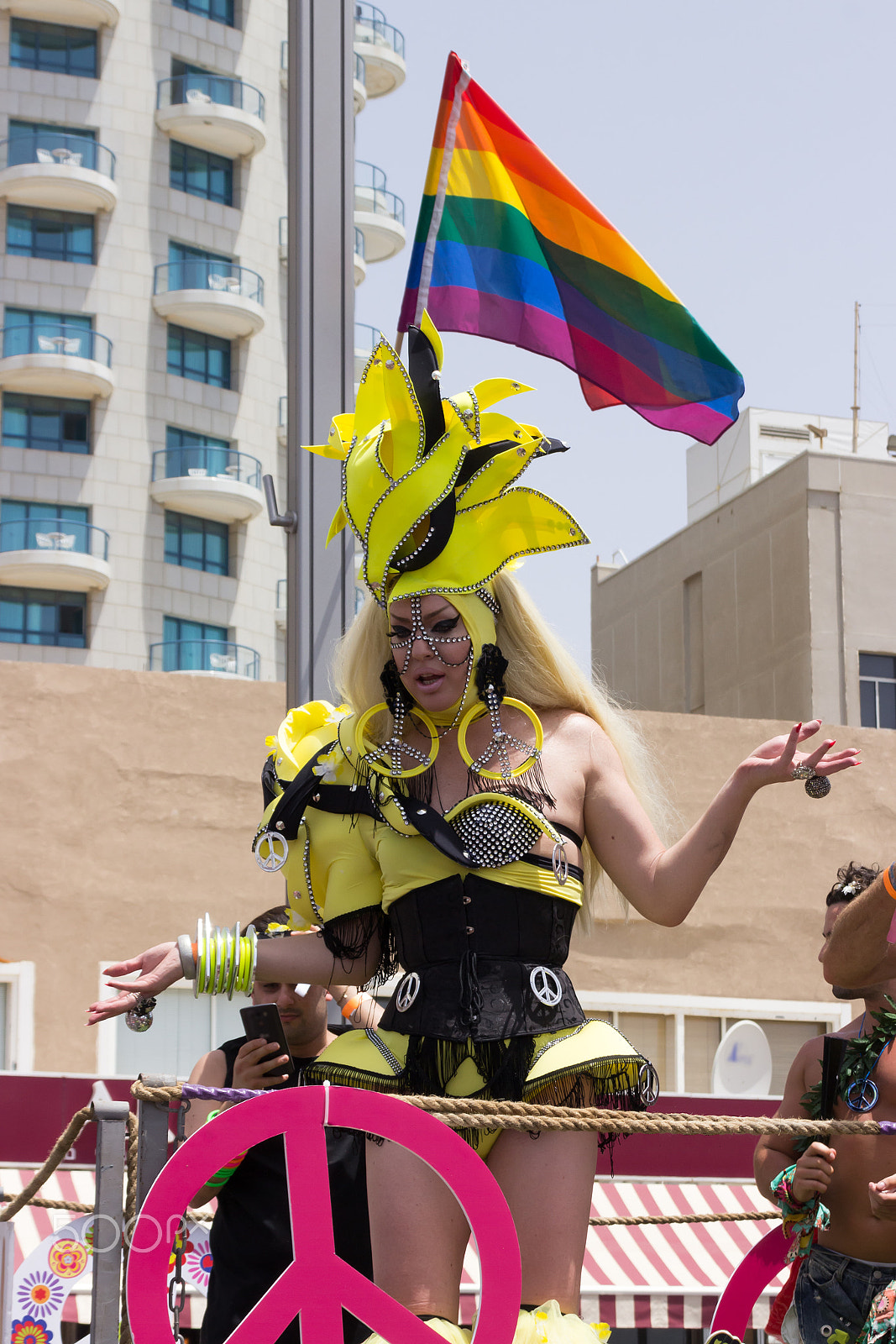 Canon EF 75-300mm F4.0-5.6 IS USM sample photo. Members of pride parade poses for the photographer photography