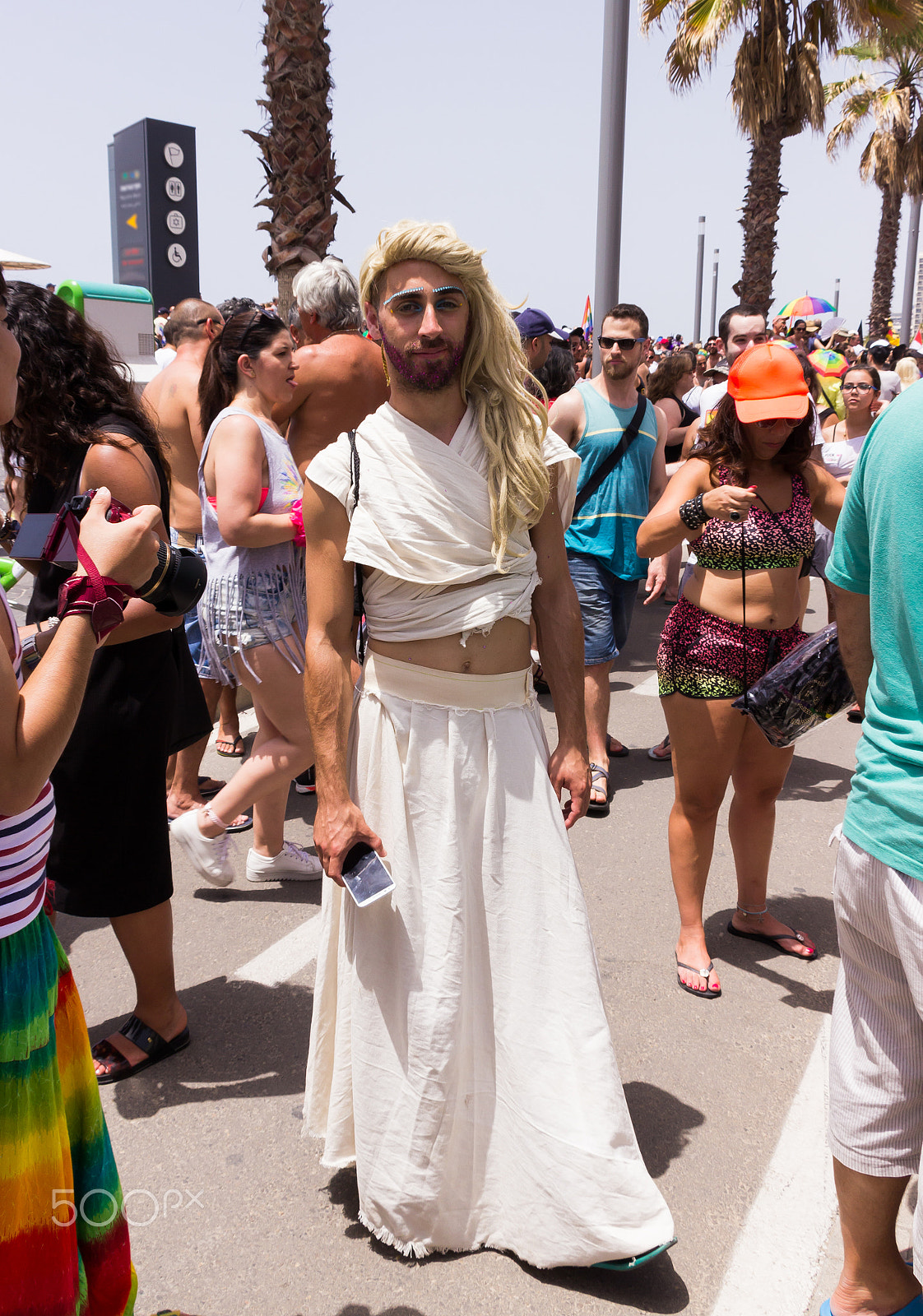 Canon EF 75-300mm F4.0-5.6 IS USM sample photo. Members of pride parade poses for the photographer photography