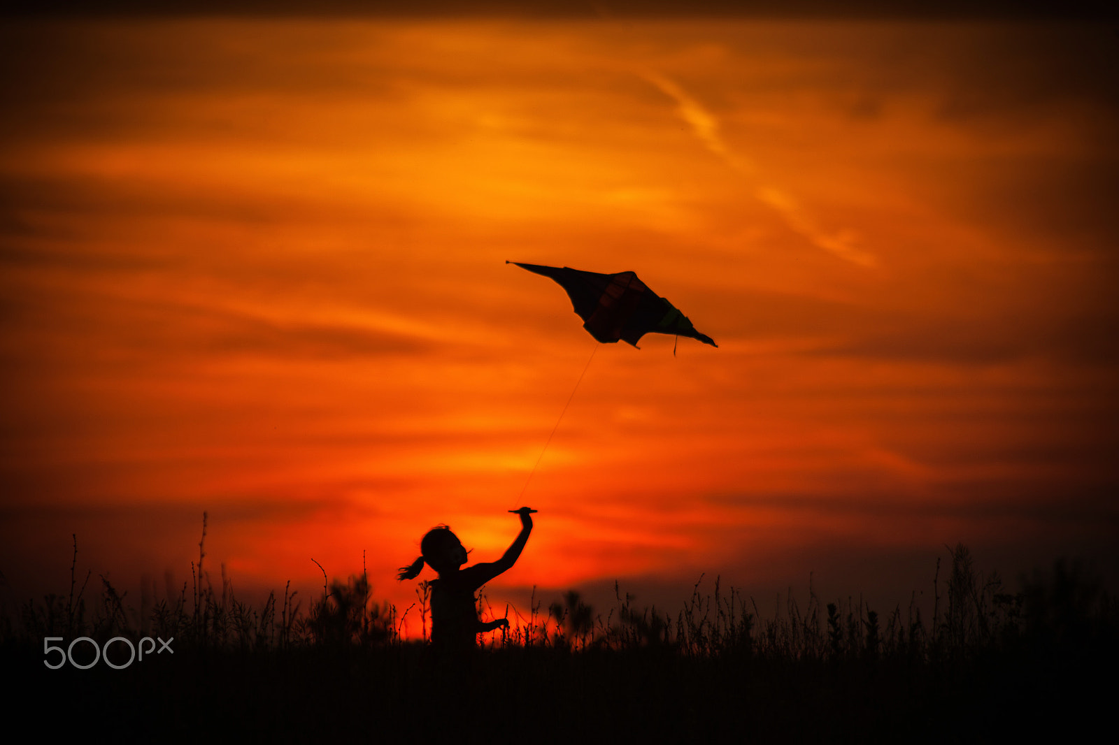 Canon EF 75-300mm f/4-5.6 USM sample photo. Girl and kite flying at sunset photography