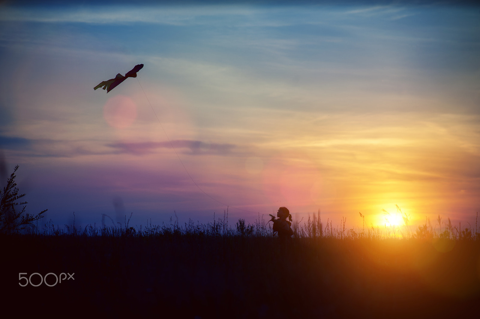 Canon EF 75-300mm f/4-5.6 USM sample photo. Girl and kite flying at sunset photography