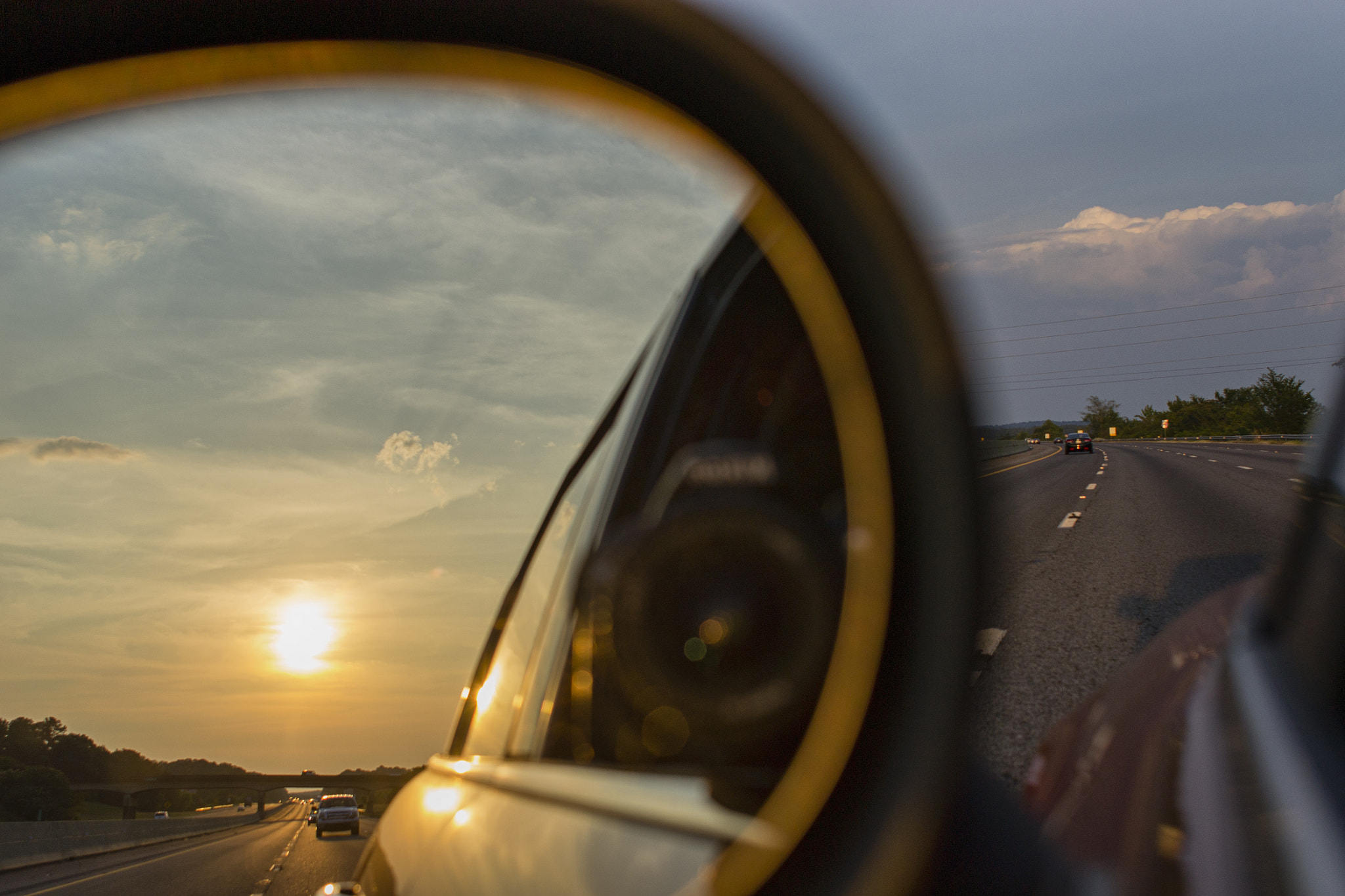 Nikon D3100 + Nikon AF Nikkor 24mm F2.8D sample photo. Sunset through rear view mirror photography