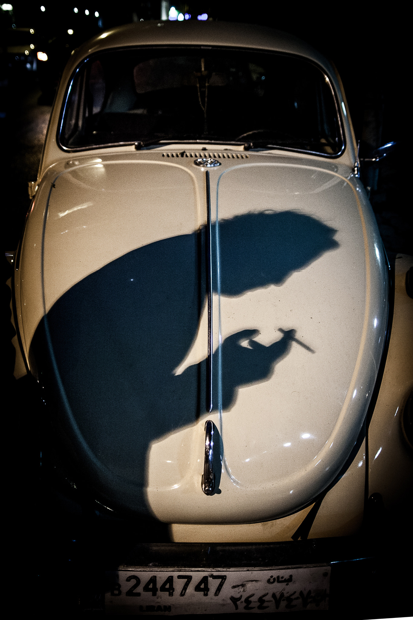 Sigma 20mm EX f/1.8 sample photo. Shadow's person smoking photography