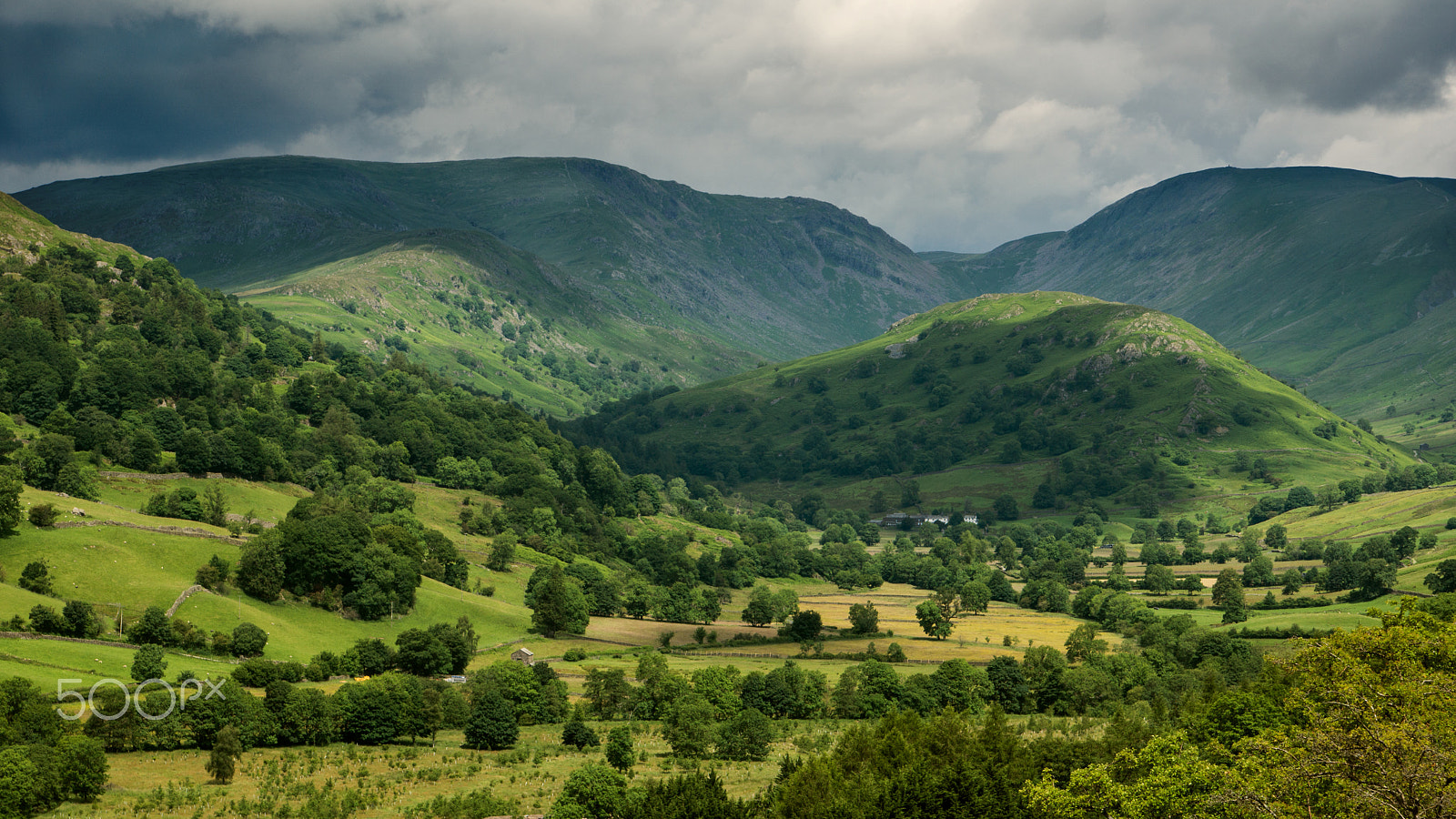 Sony SLT-A77 sample photo. Sunny valley, moody mountains. photography