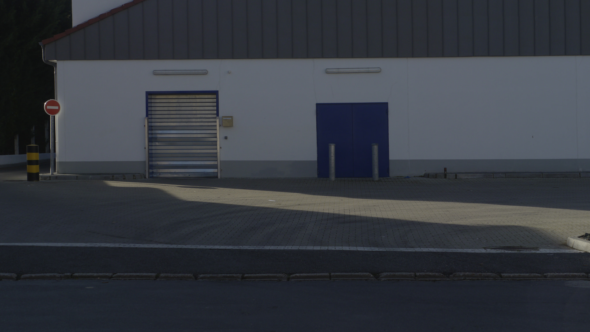 Panasonic Lumix DMC-GH2 sample photo. Supermarket loading area photography