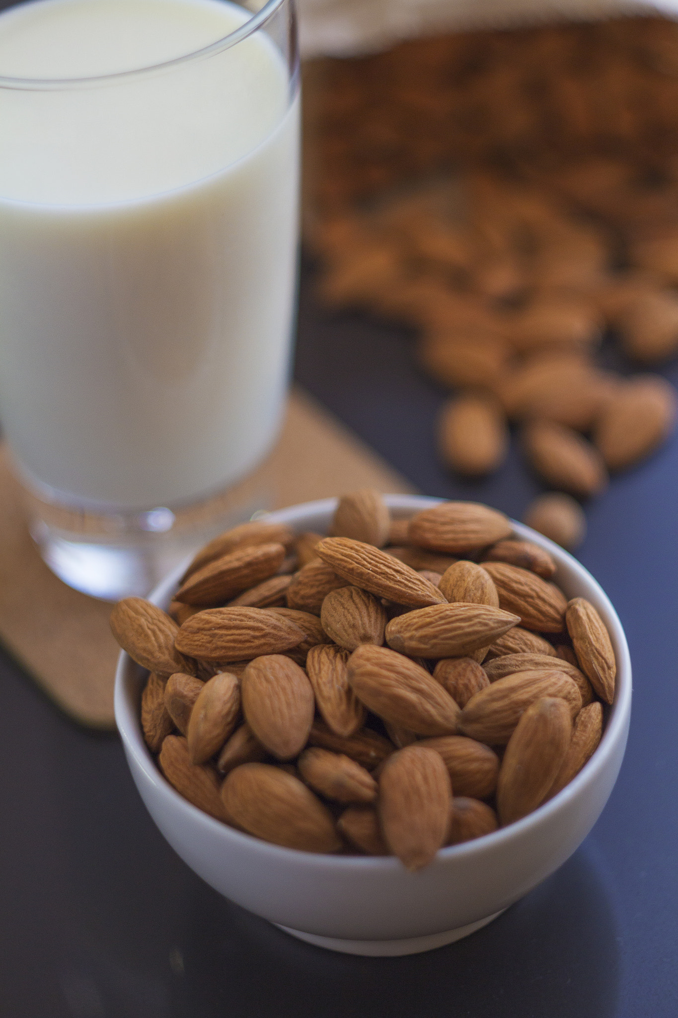 Canon EF 35-80mm f/4-5.6 sample photo. Vegan organic almond milk. selective focus. photography