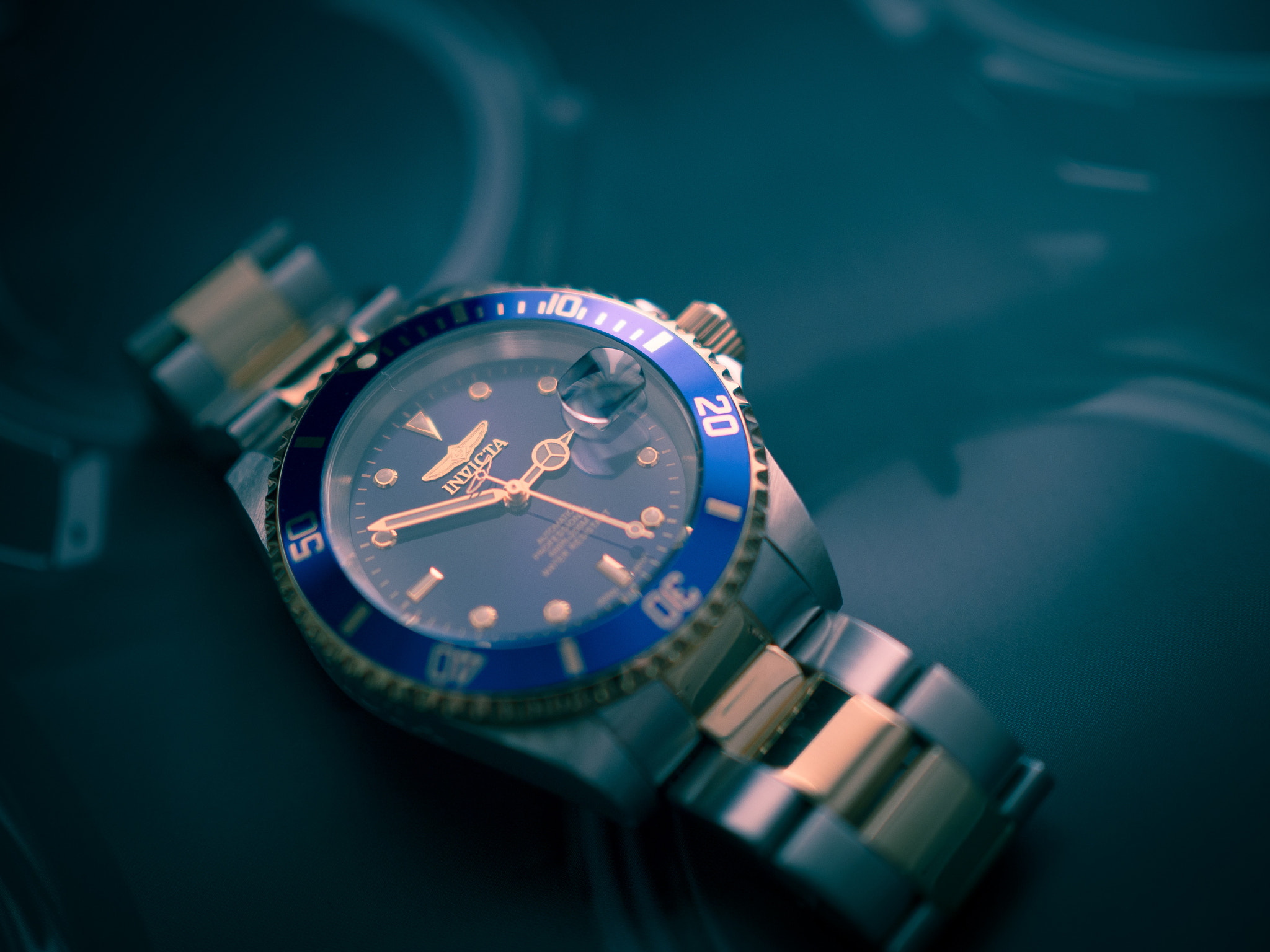 Olympus OM-D E-M10 II + Olympus M.Zuiko Digital 25mm F1.8 sample photo. Invicta pro diver mechanical watch photography