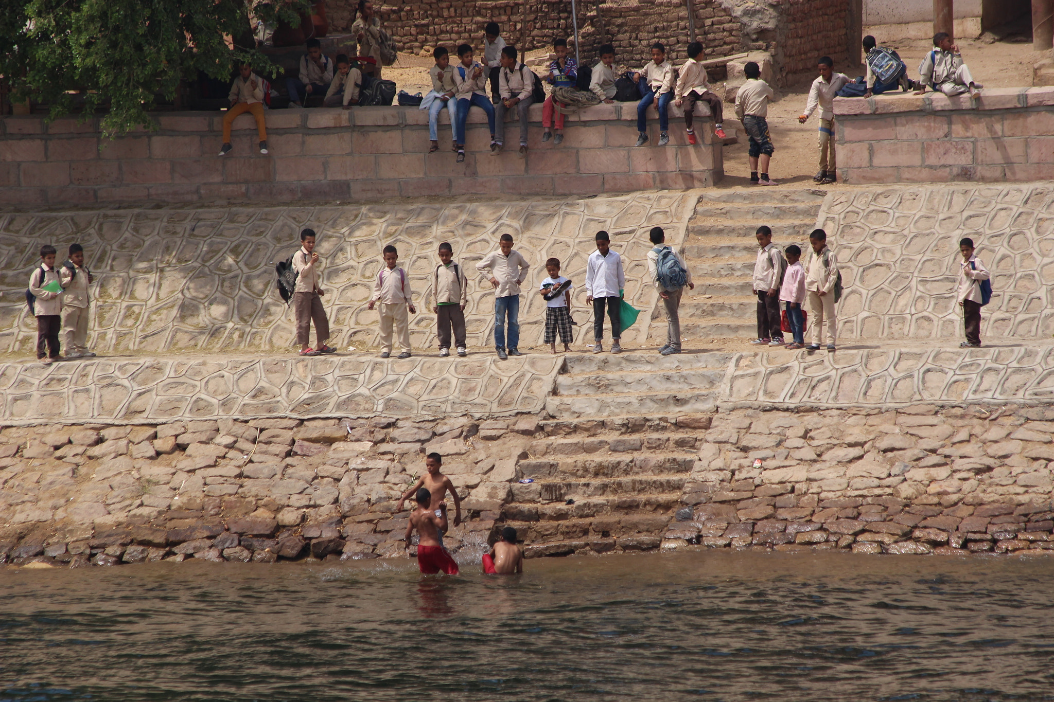 Canon EF 70-300mm F4-5.6 IS USM sample photo. Coming home from school, life by the river nile, egypt. photography