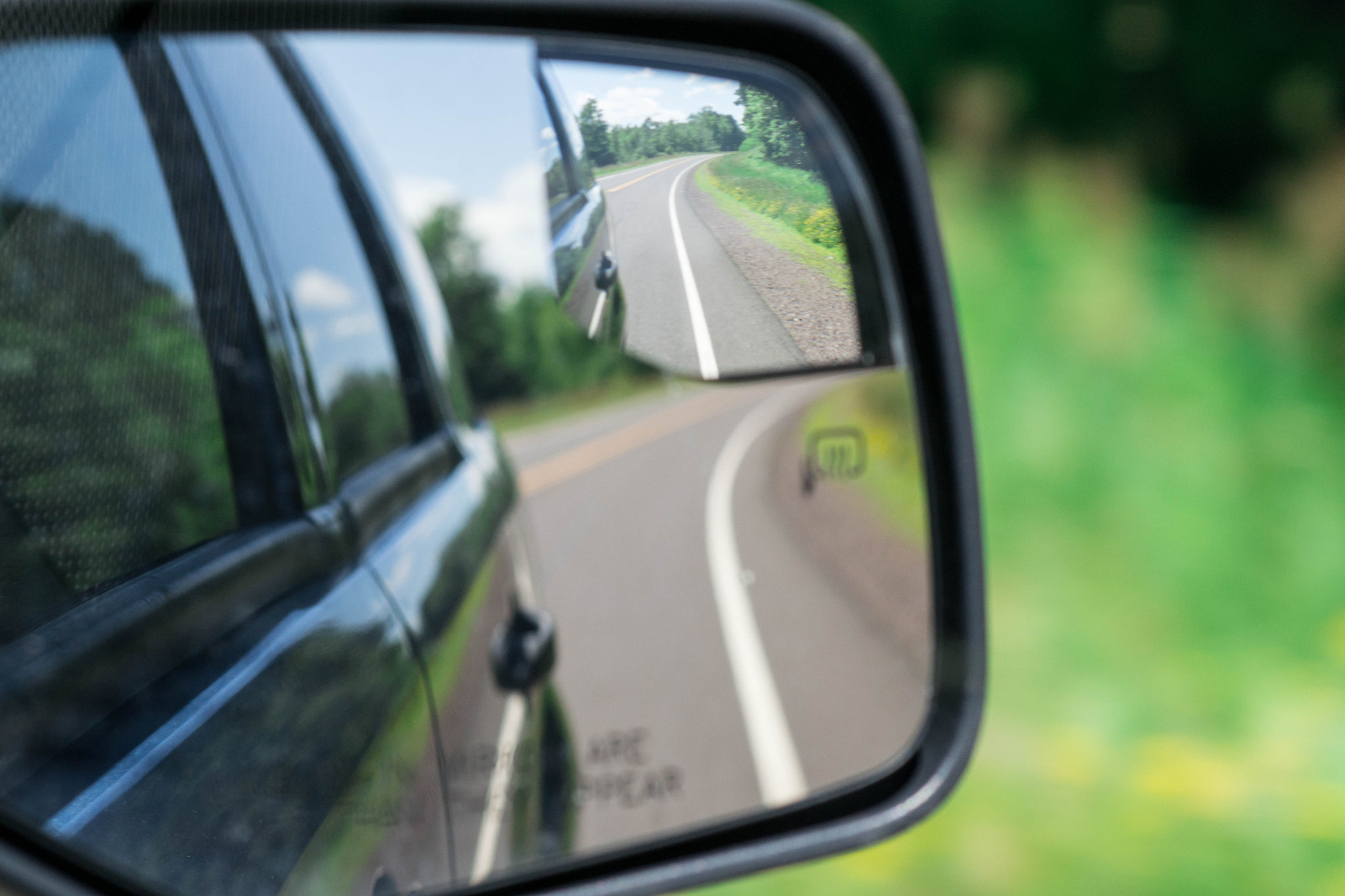 Nikon D3100 + Nikon AF-S Nikkor 85mm F1.8G sample photo. Sideview mirror photography