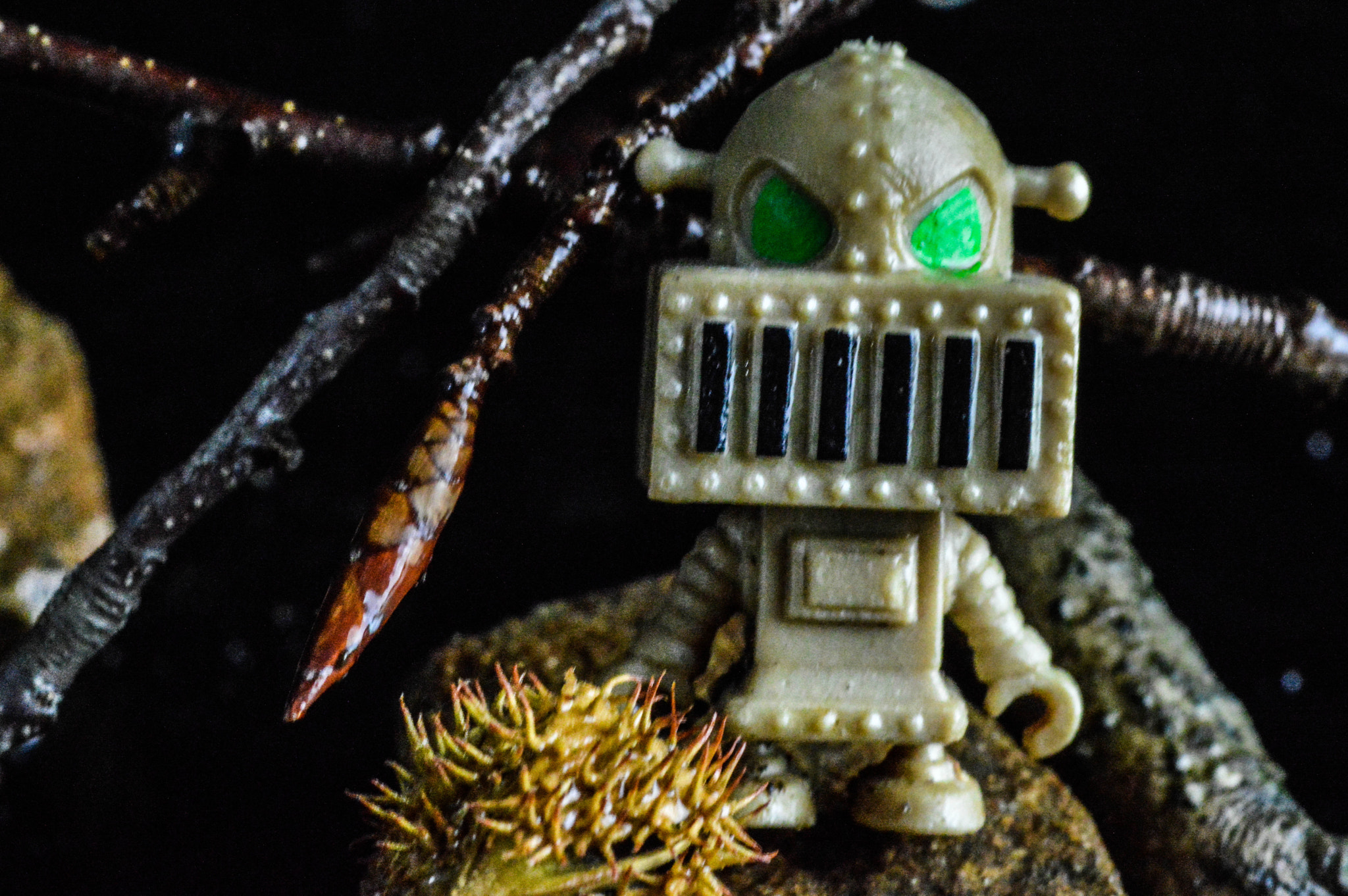 Nikon D3200 + Tamron SP 90mm F2.8 Di VC USD 1:1 Macro sample photo. I'm obsessed with this little plastic dude. :d photography