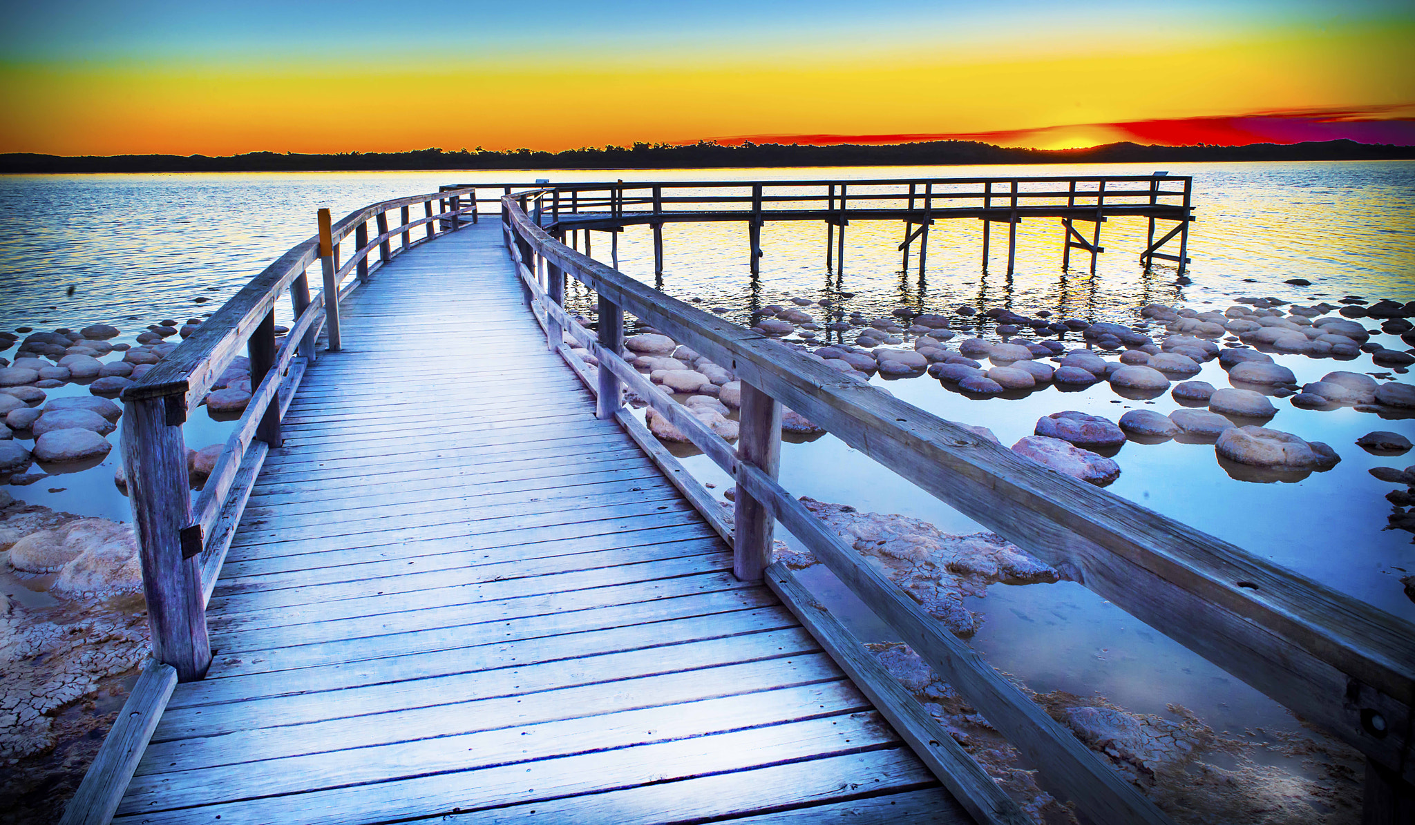 Nikon D4 + Nikon AF Nikkor 24mm F2.8D sample photo. Sunset jetty photography