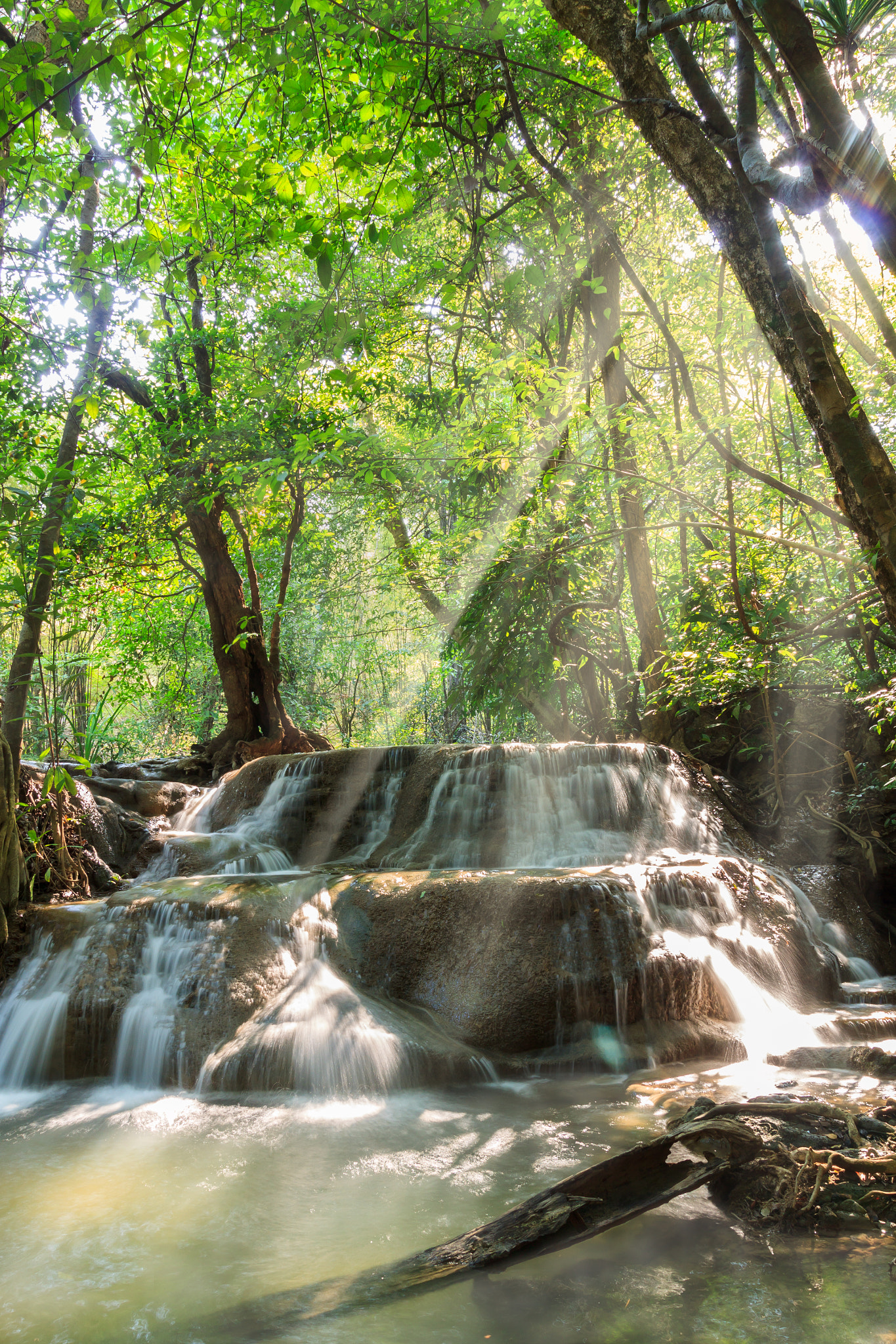 Canon EOS 500D (EOS Rebel T1i / EOS Kiss X3) sample photo. Waterfall in deep tropical forest with fog and sun beam photography
