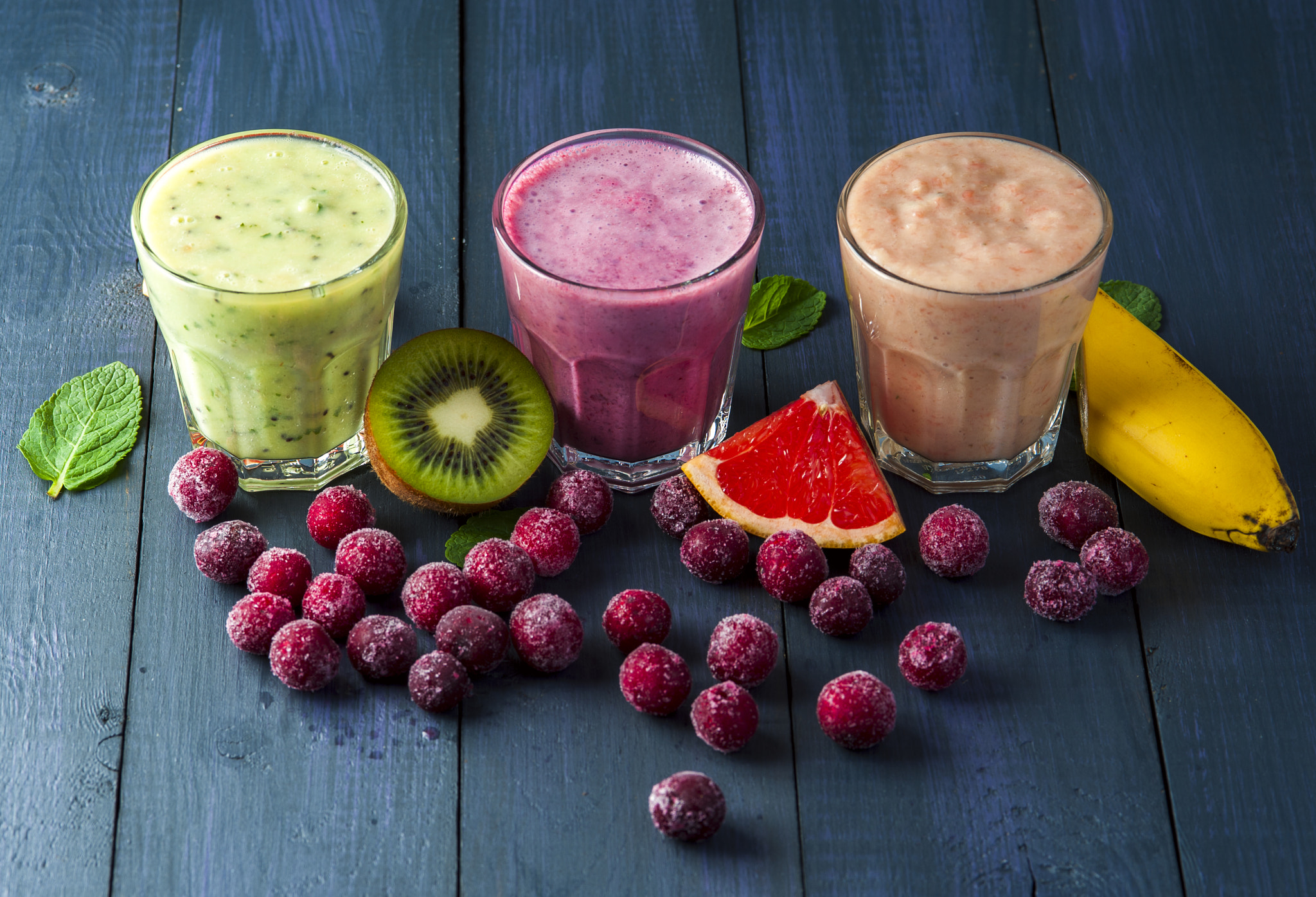 Nikon D700 + AF Micro-Nikkor 105mm f/2.8 sample photo. Glasses of homemade smoothie with grapefruit, kiwi, cherry and mint leaves . conception of... photography