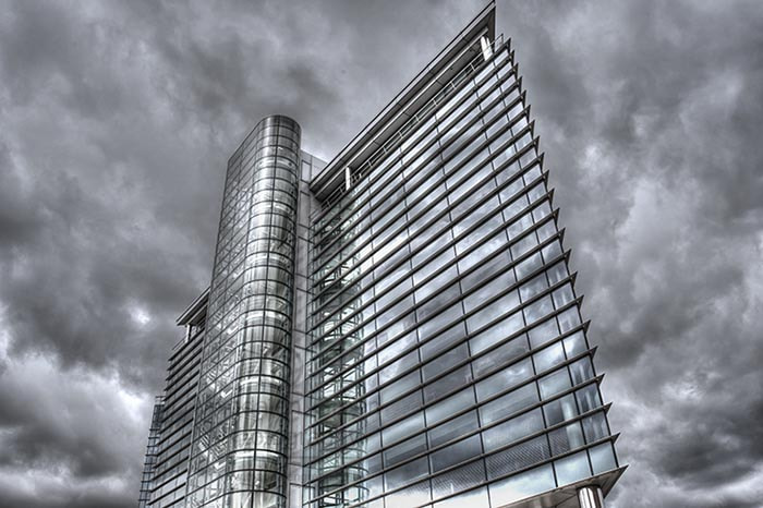 AF Zoom-Nikkor 28-80mm f/3.3-5.6G sample photo. Steel glass and clouds  - leeds england photography