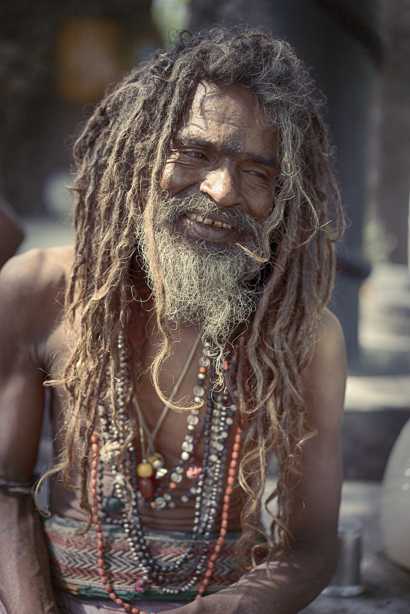 Sony a7S II + Sony Sonnar T* FE 55mm F1.8 ZA sample photo. Baba doing nothing but smoking photography