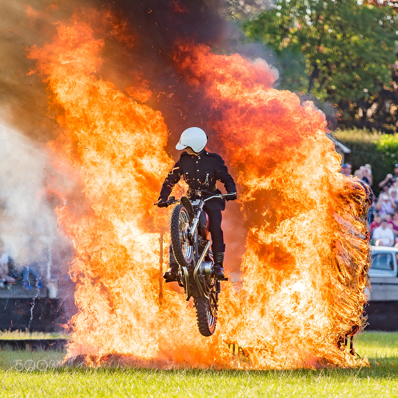 Sigma 70-200mm F2.8 EX DG Macro HSM II sample photo. White helmets fire jump photography